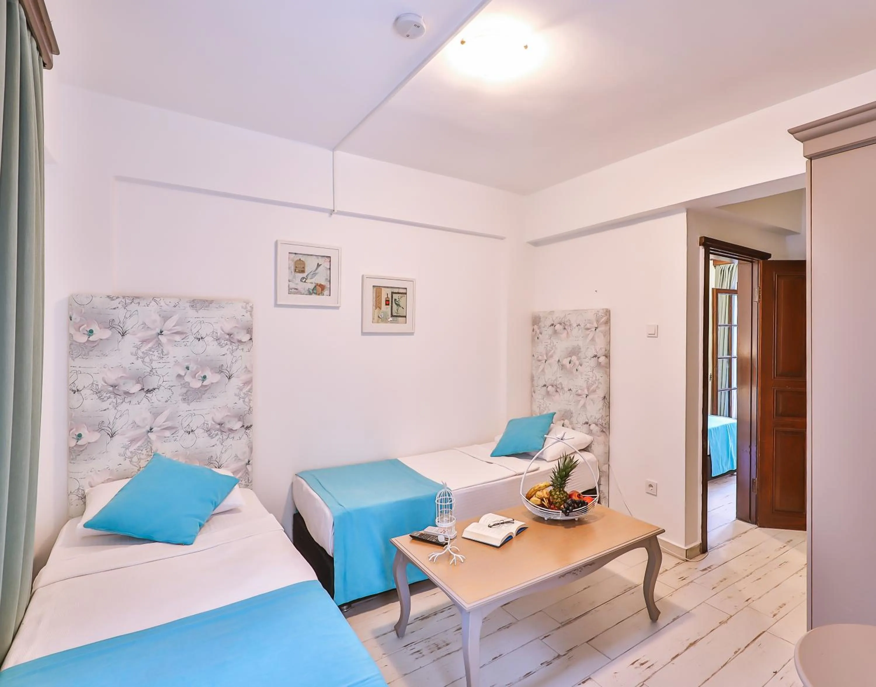 Bed in Mare Garden Hotel