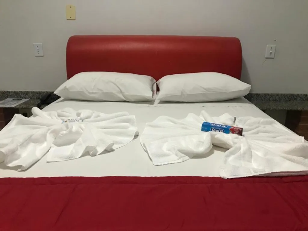 Bed in Hotel Oliveira