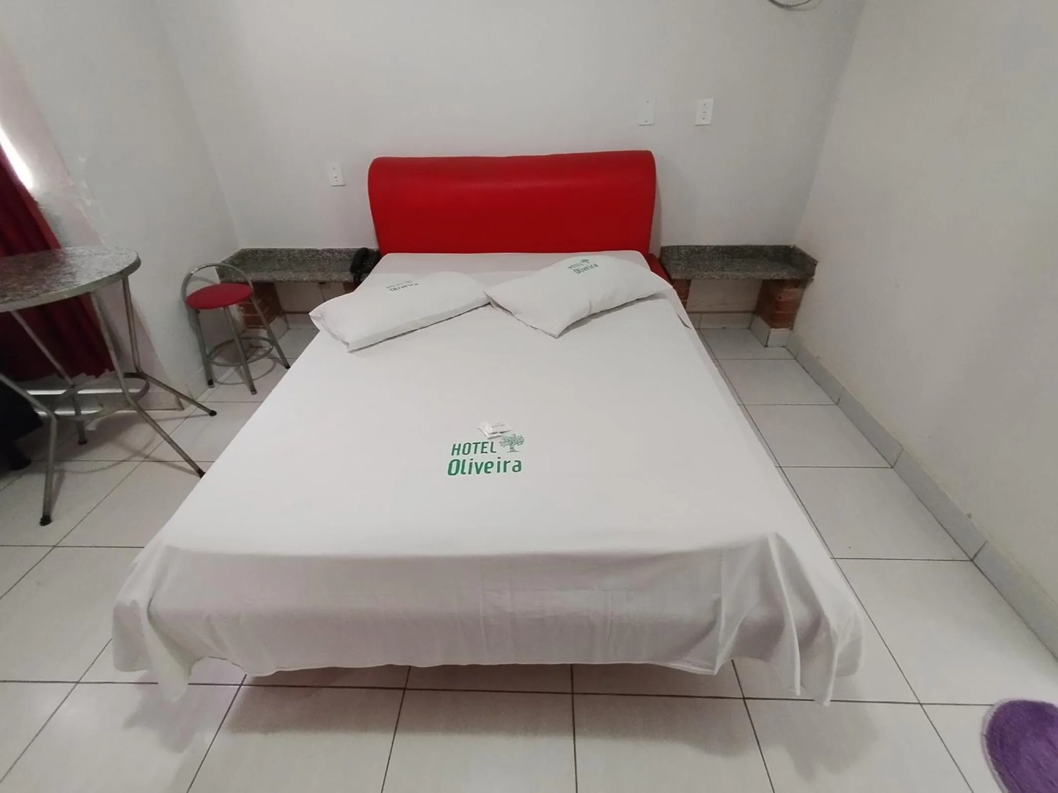 Bed in Hotel Oliveira