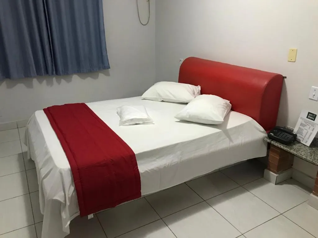 Bed in Hotel Oliveira