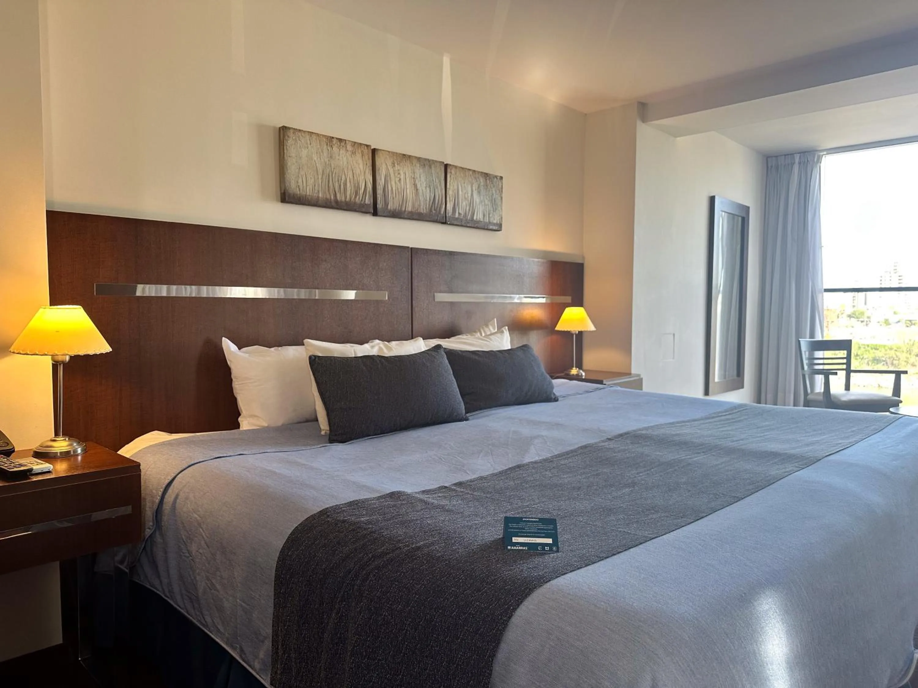 Bed in Puerto Amarras Hotel & Suites