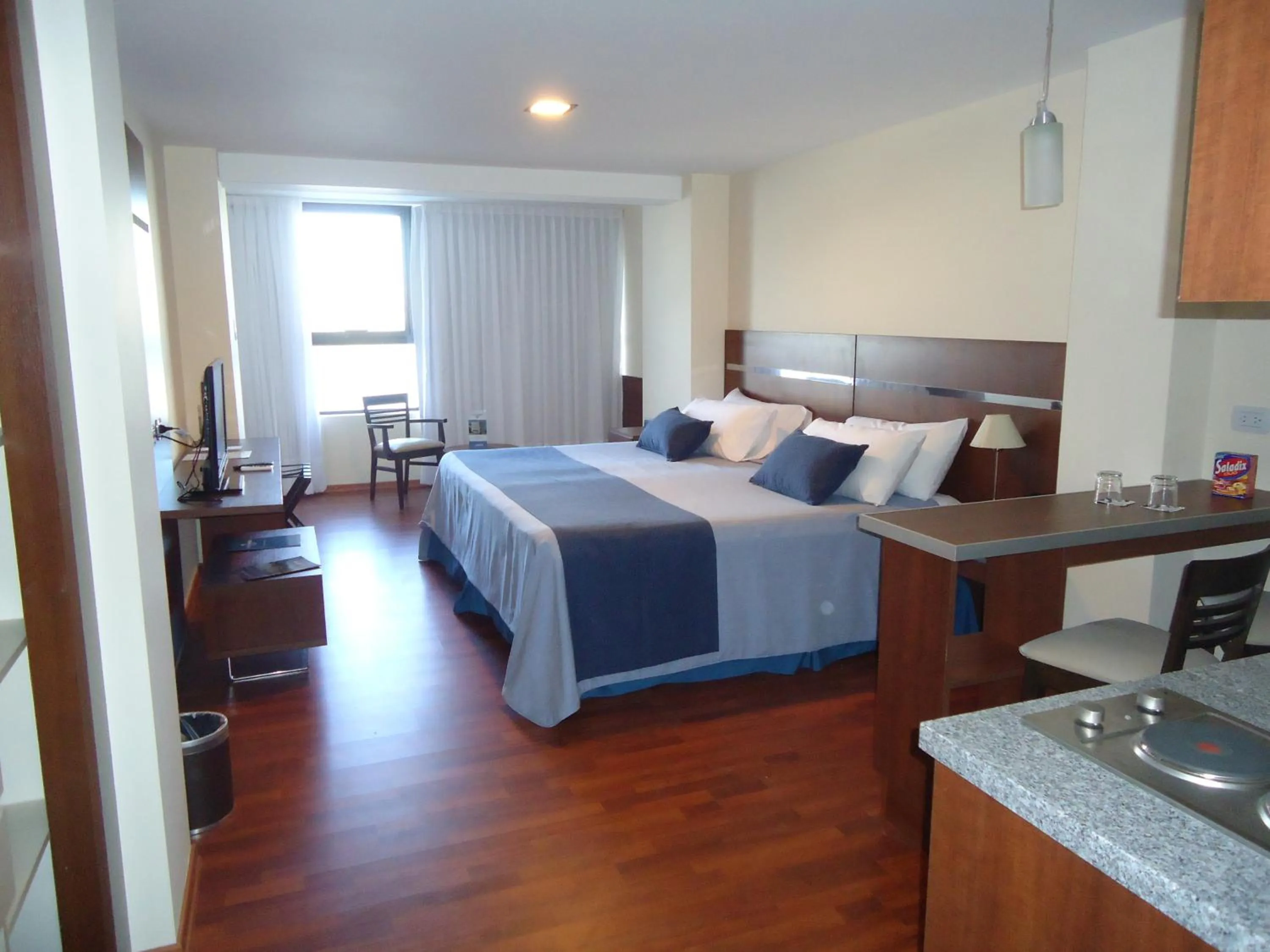 Bed in Puerto Amarras Hotel & Suites