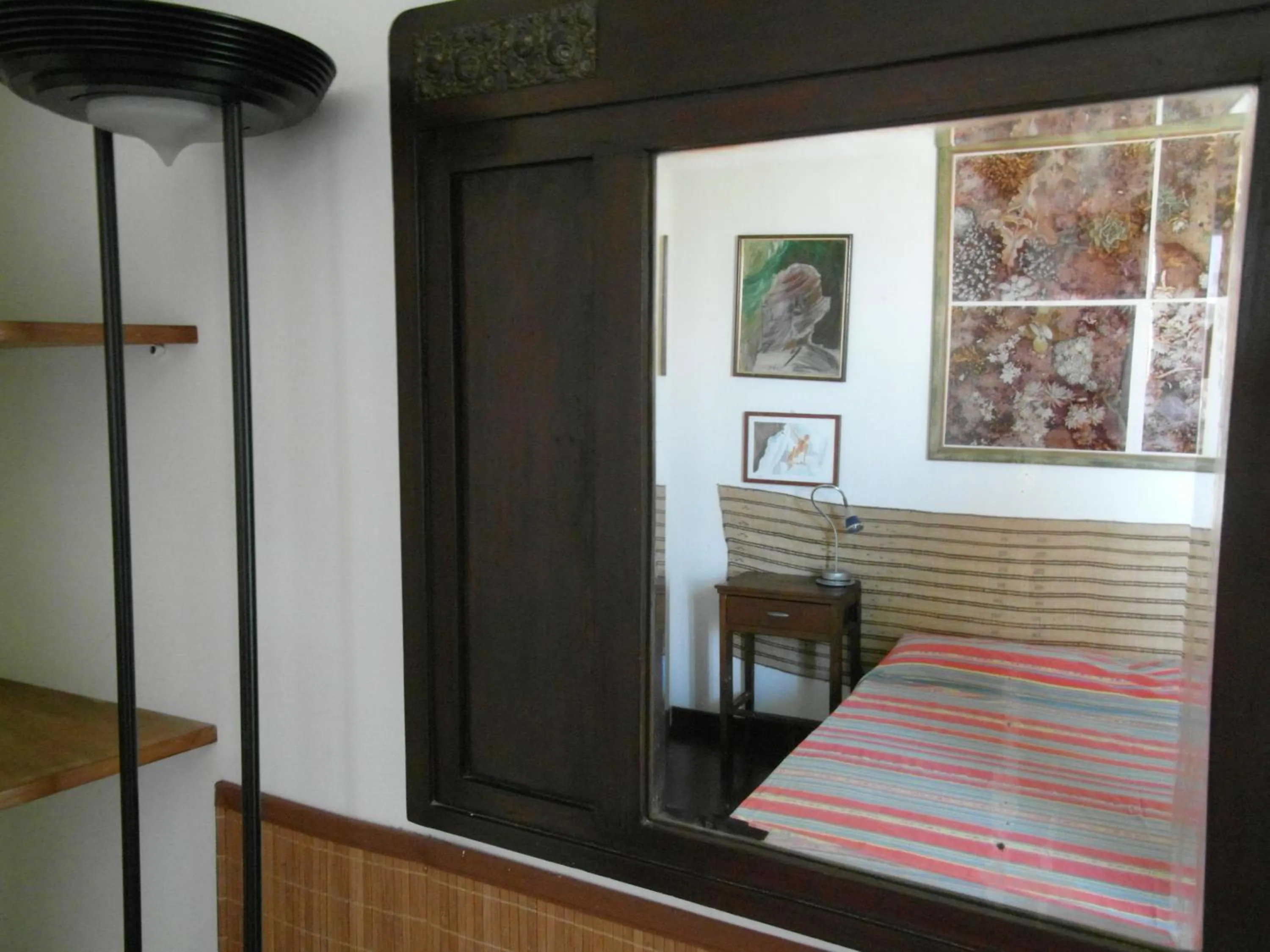 Decorative detail, Bed in Abitazione Pigneto B&B