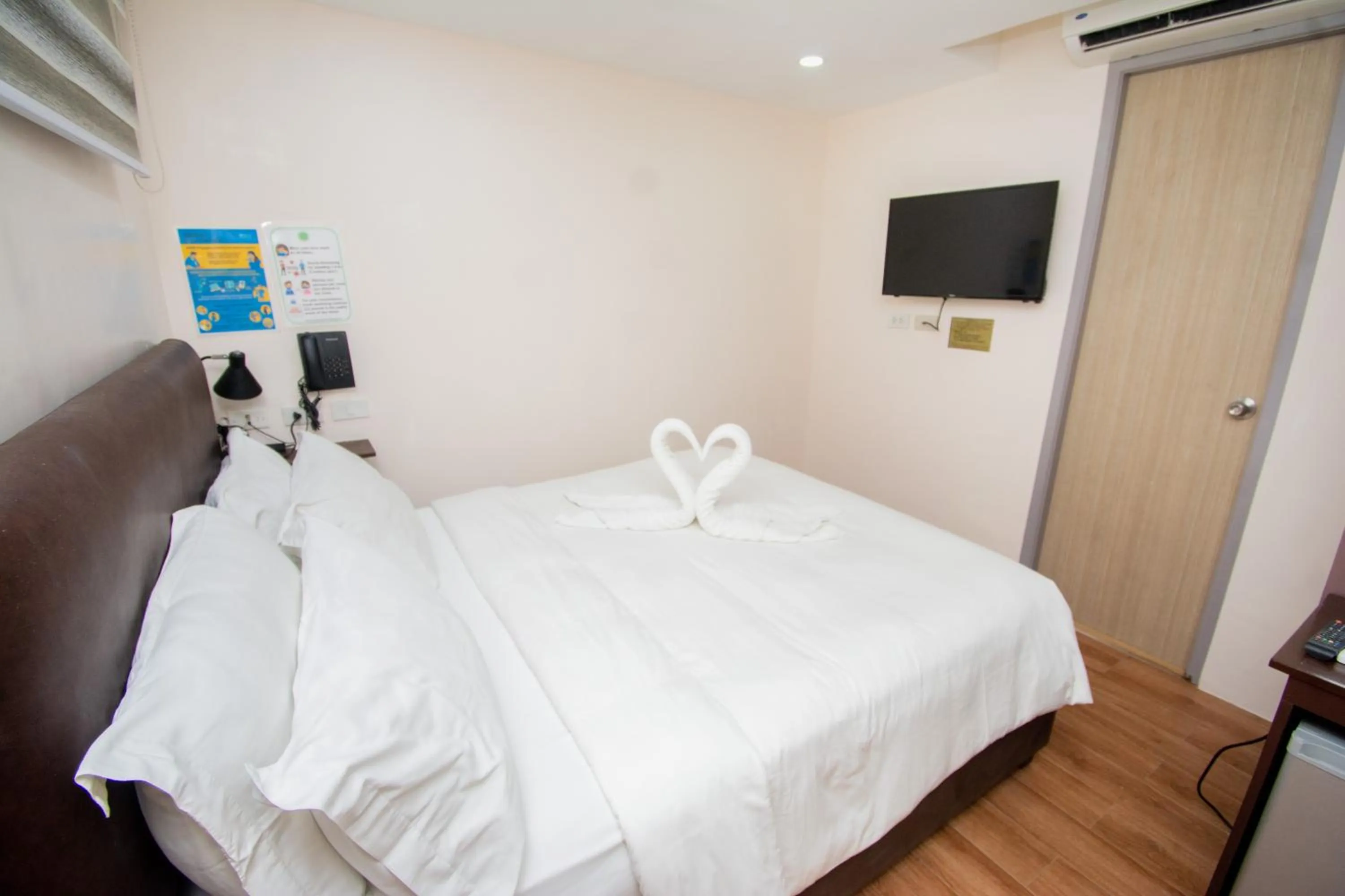 Bed in Emerald Island Hotel