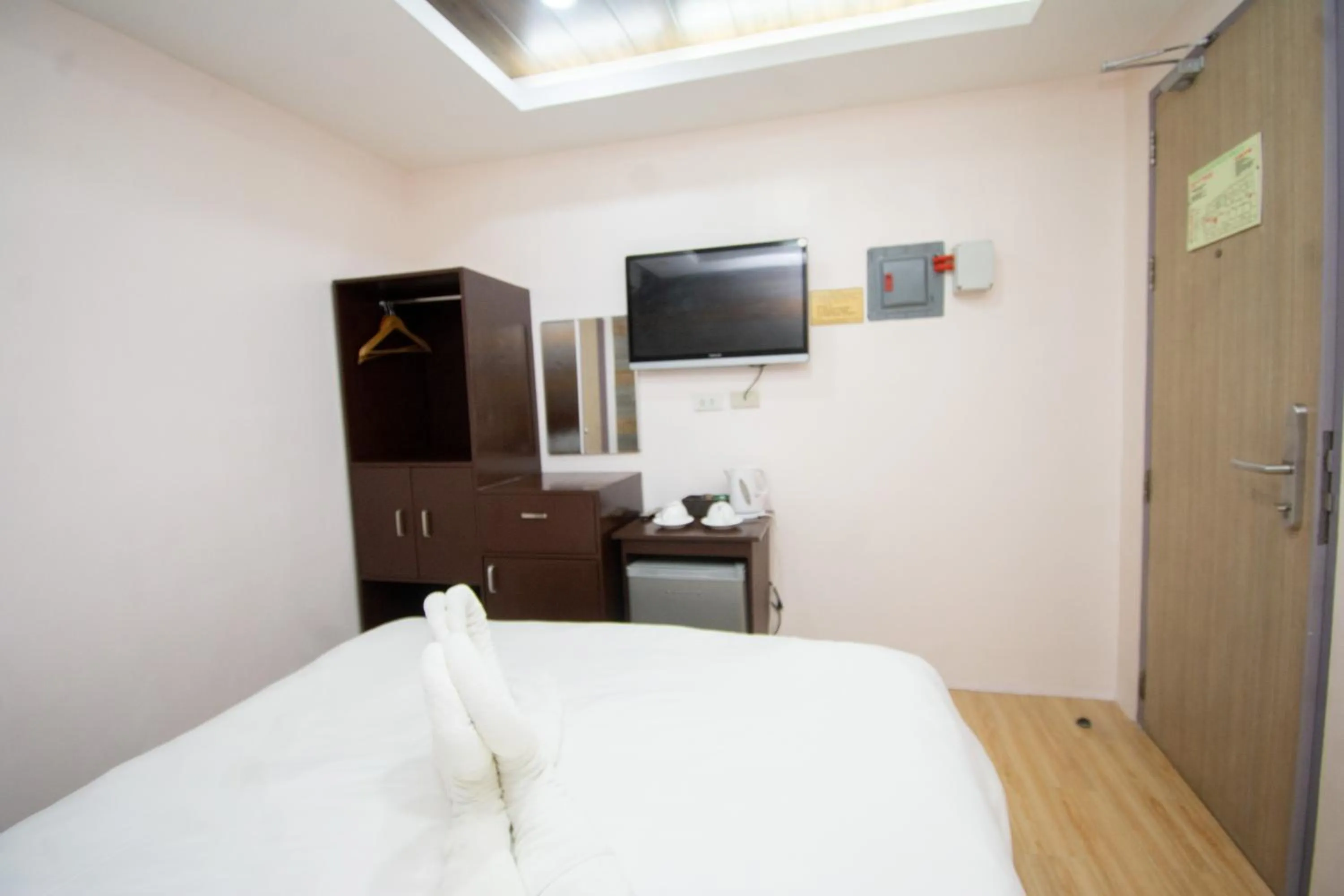 Bed in Emerald Island Hotel