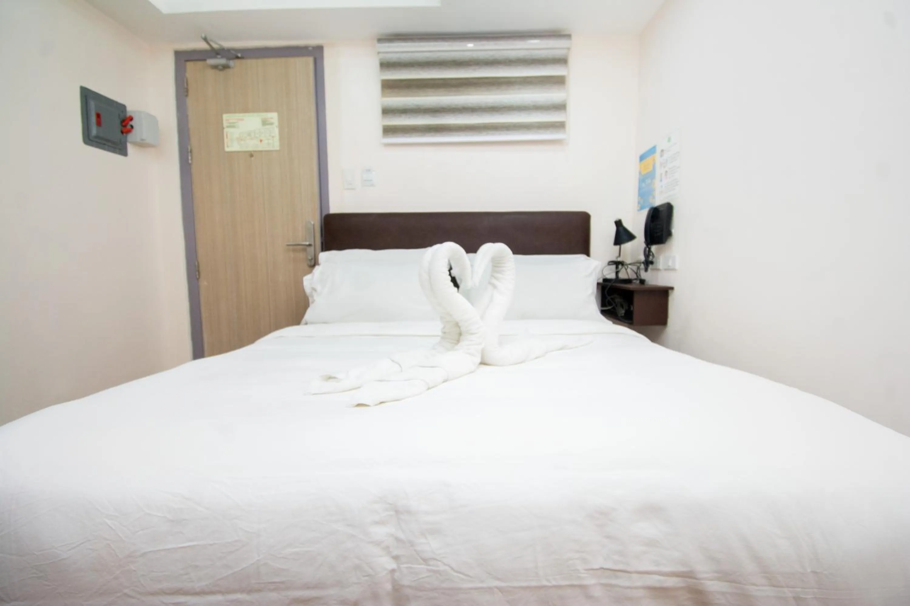 Bed in Emerald Island Hotel