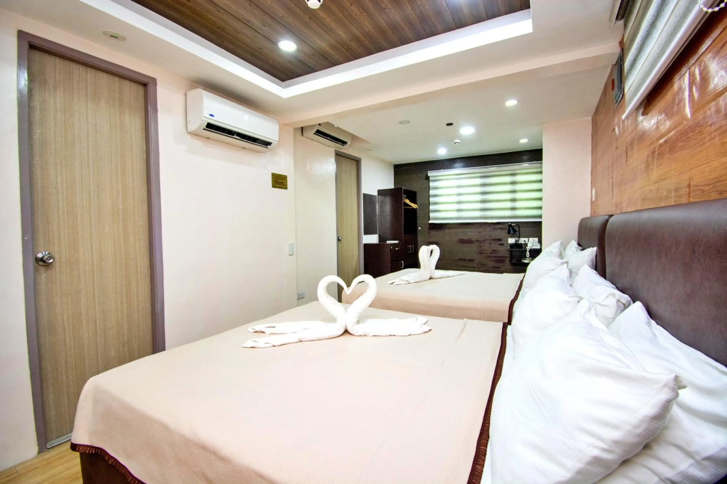 Bed in Emerald Island Hotel