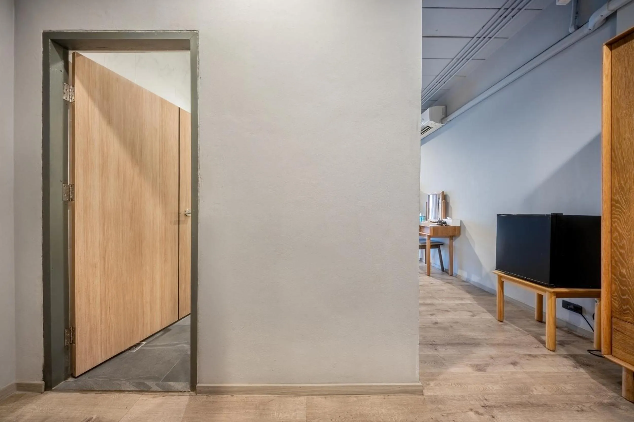 Photo of the whole room in SHIN Arch39 Phuket Beach Front - SHA Plus