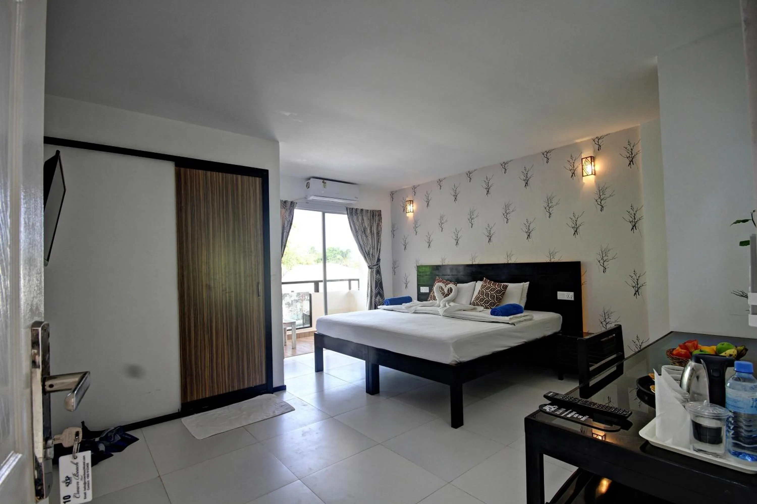 Photo of the whole room, Bed in Crown Beach Villas -Private Beach