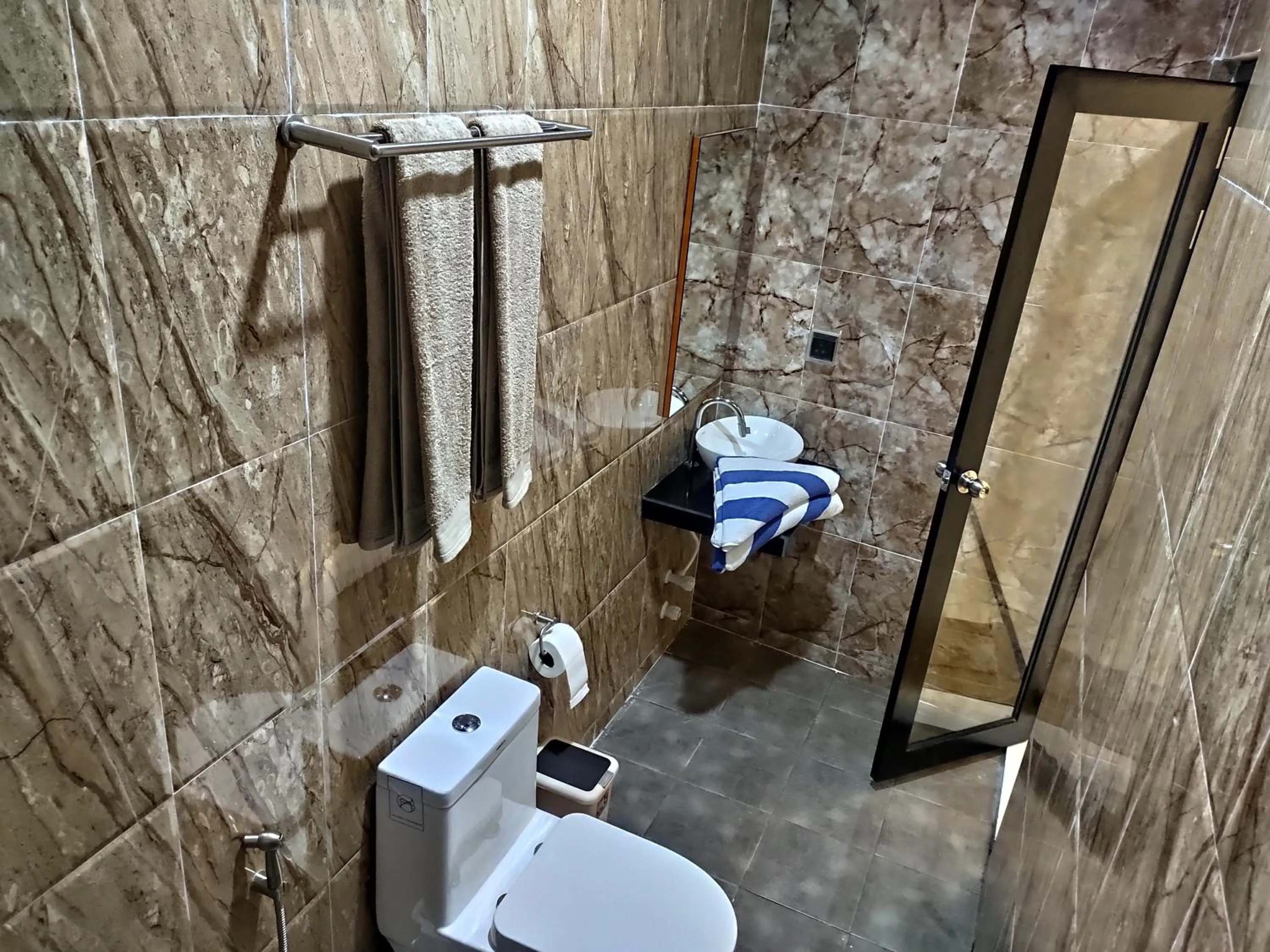 Toilet in Crown Beach Villas -Private Beach