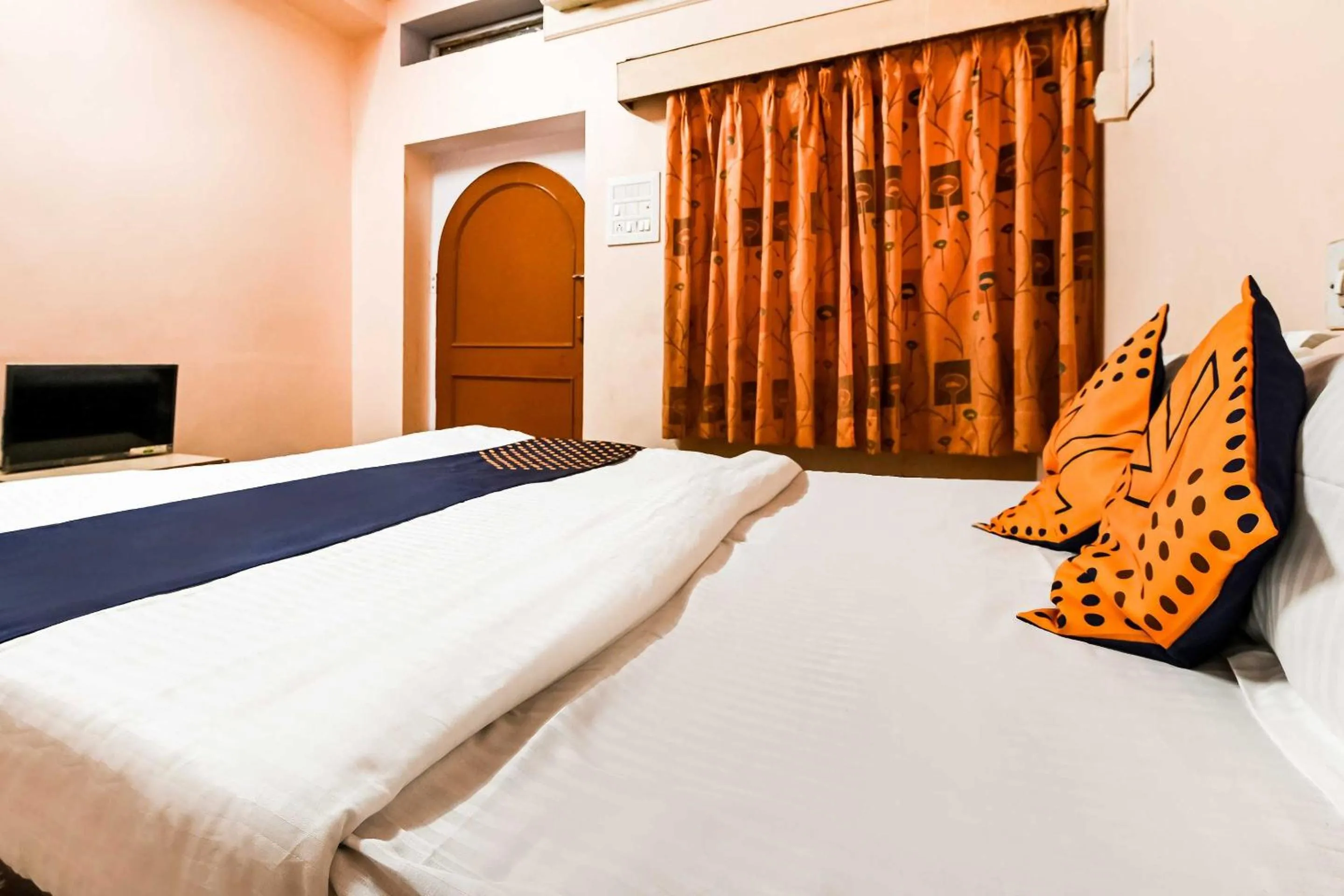 Bedroom in SPOT ON Hotel Pink Sun