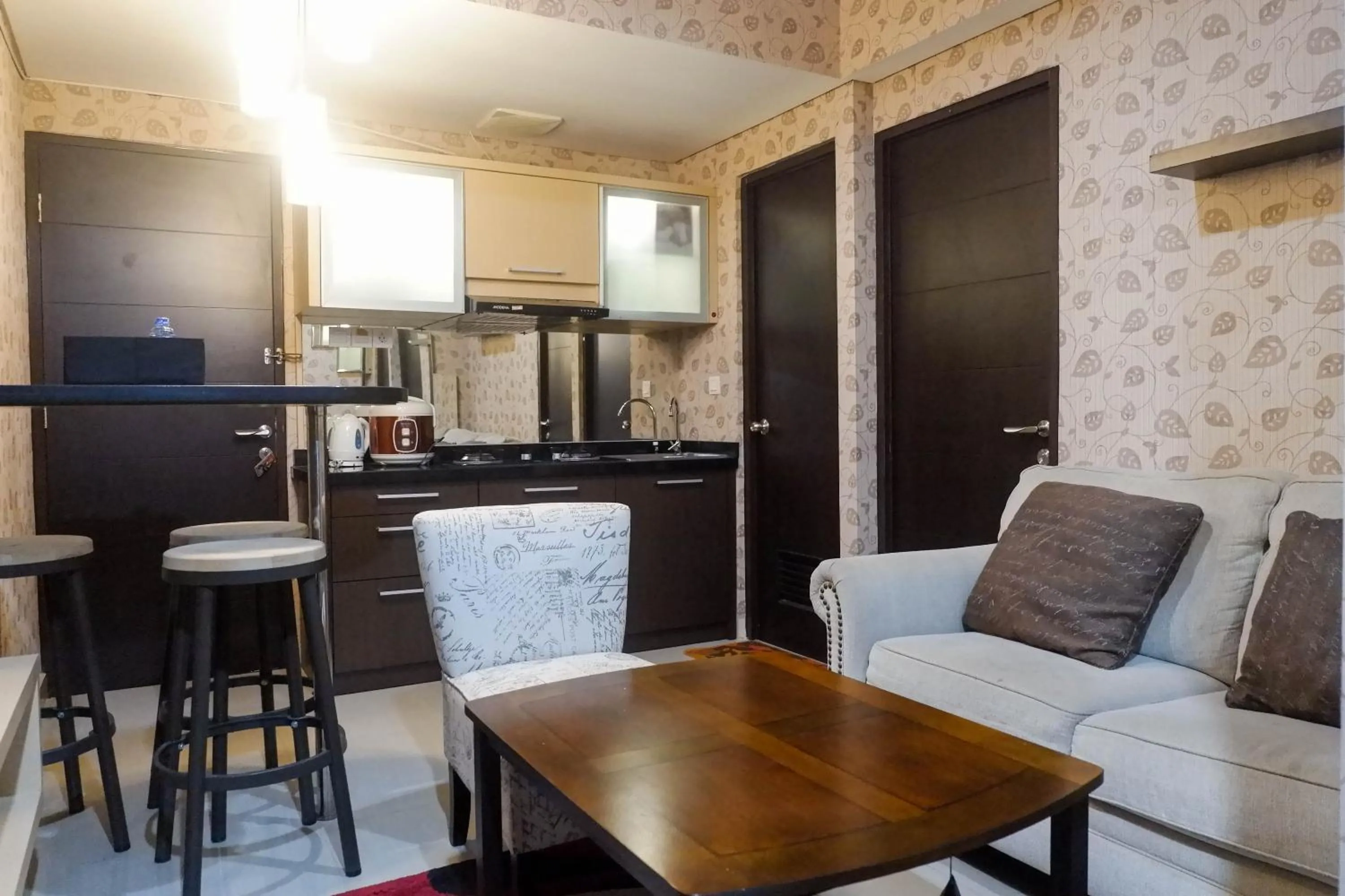 Photo of the whole room in Minimalist 2BR Apartment at Tamansari Papilio By Travelio