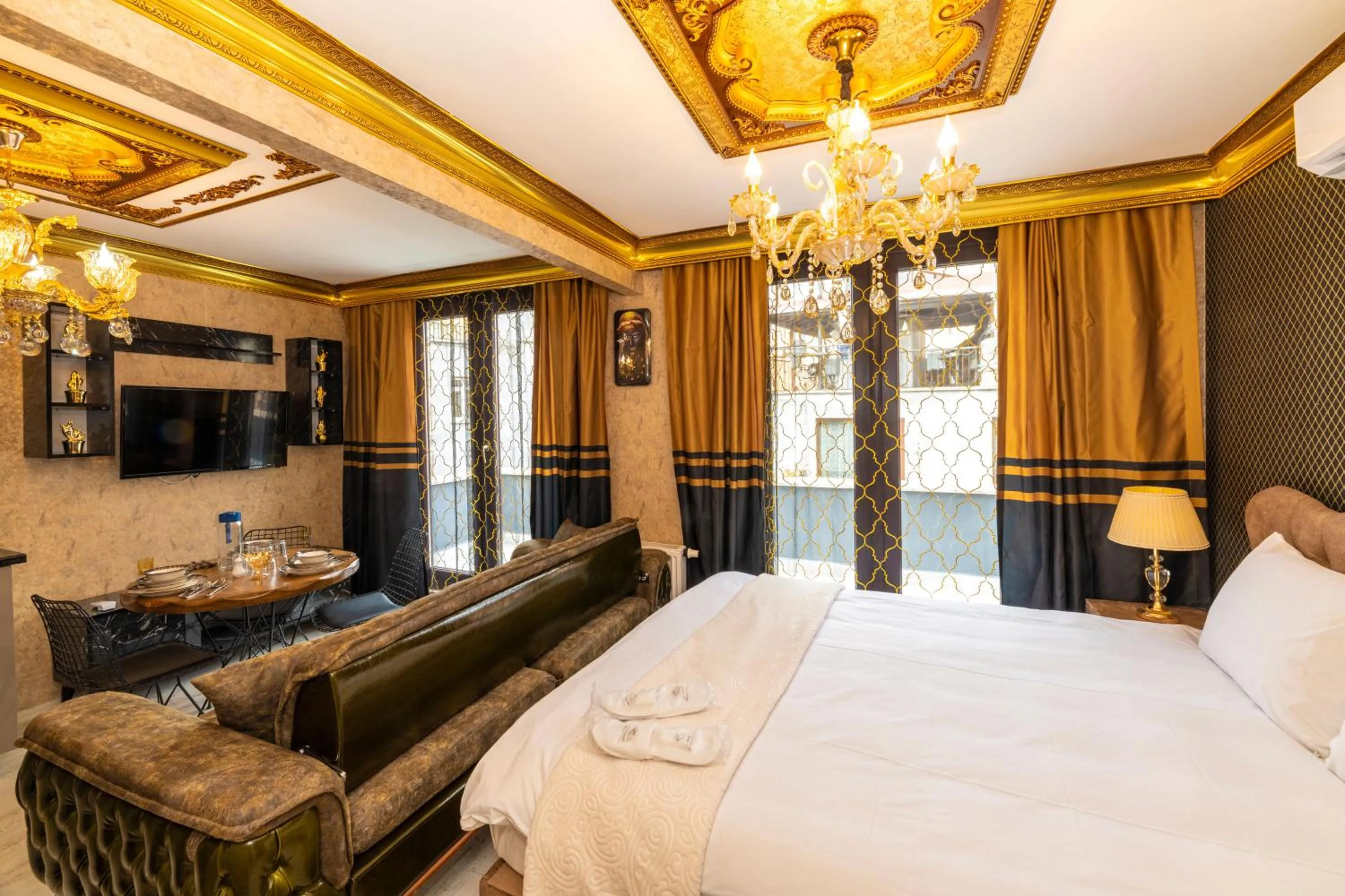 Communal lounge/ TV room, Bed in Istanbul Taksim Residence Hotel By MESUT