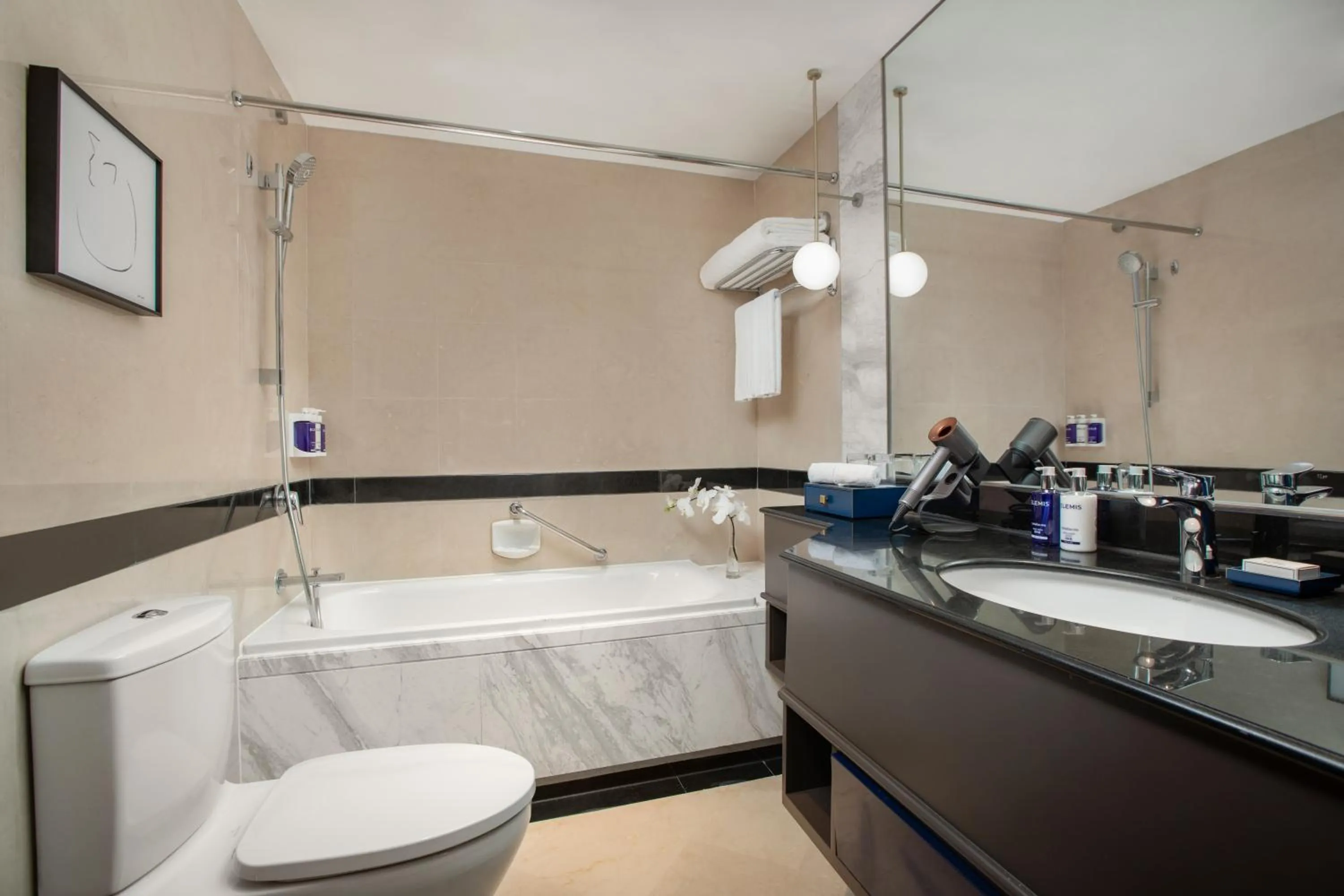 Toilet in voco Wuhan Xinhua by IHG