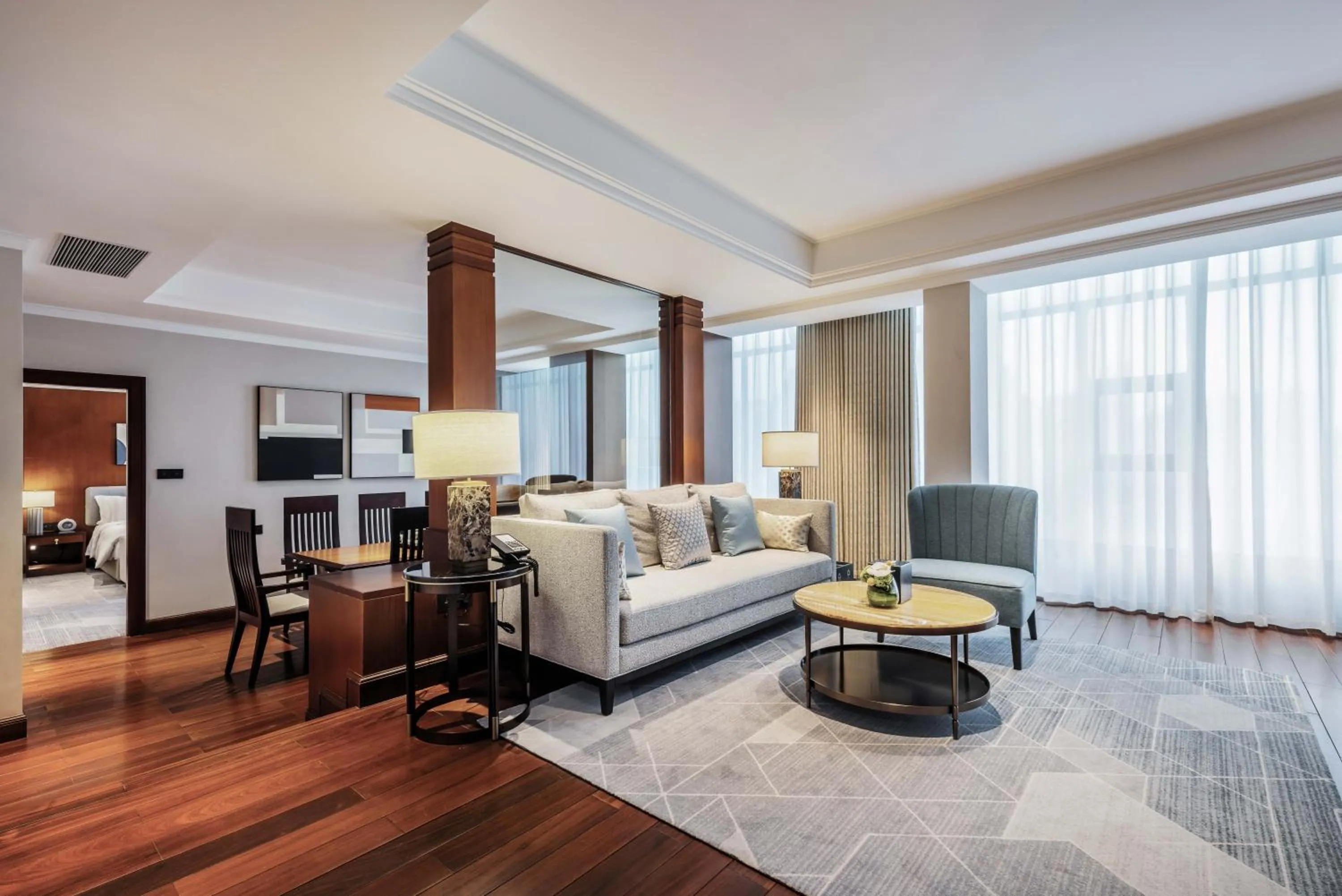 Living room in voco Wuhan Xinhua by IHG