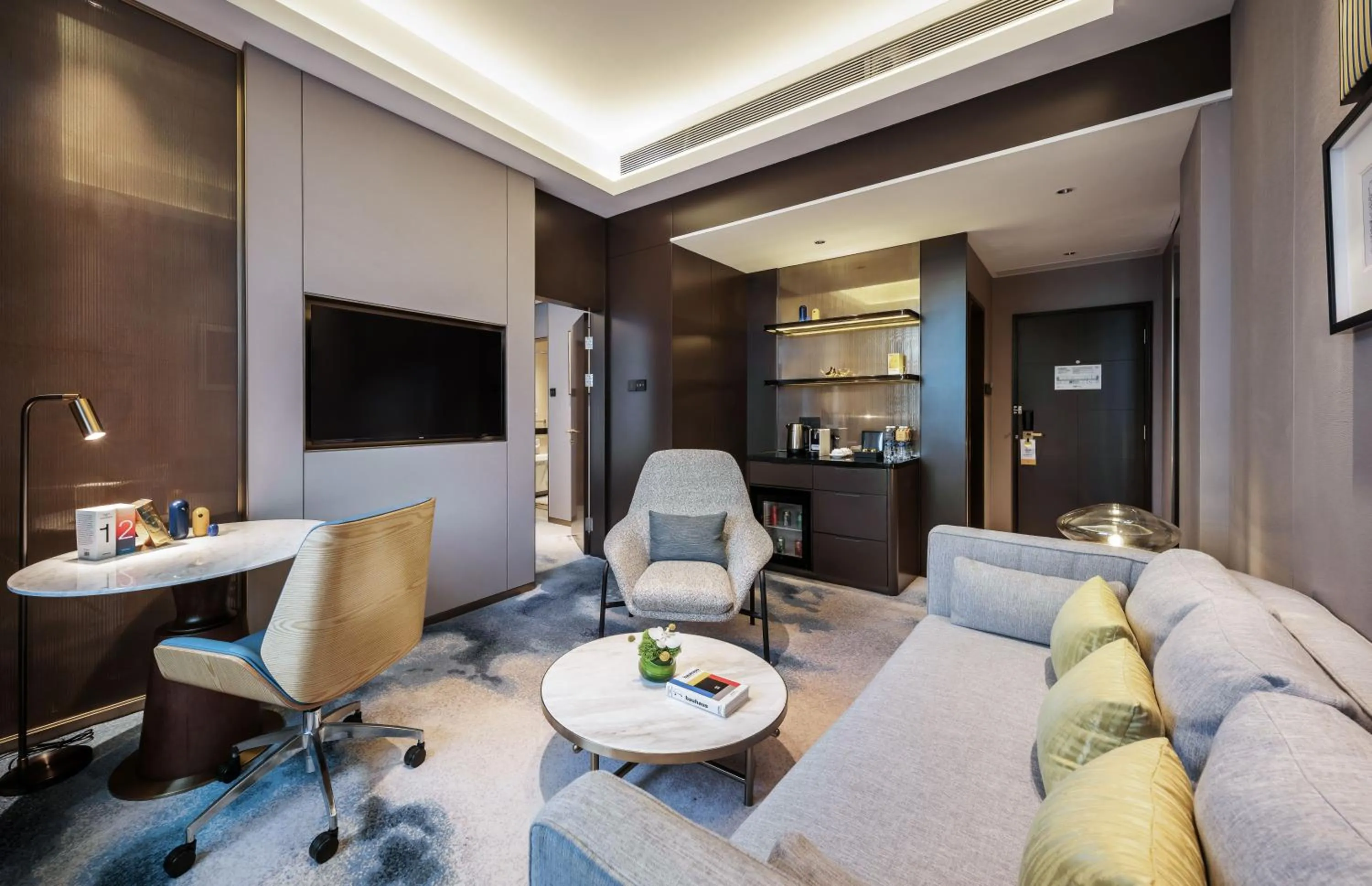 Living room in voco Wuhan Xinhua by IHG