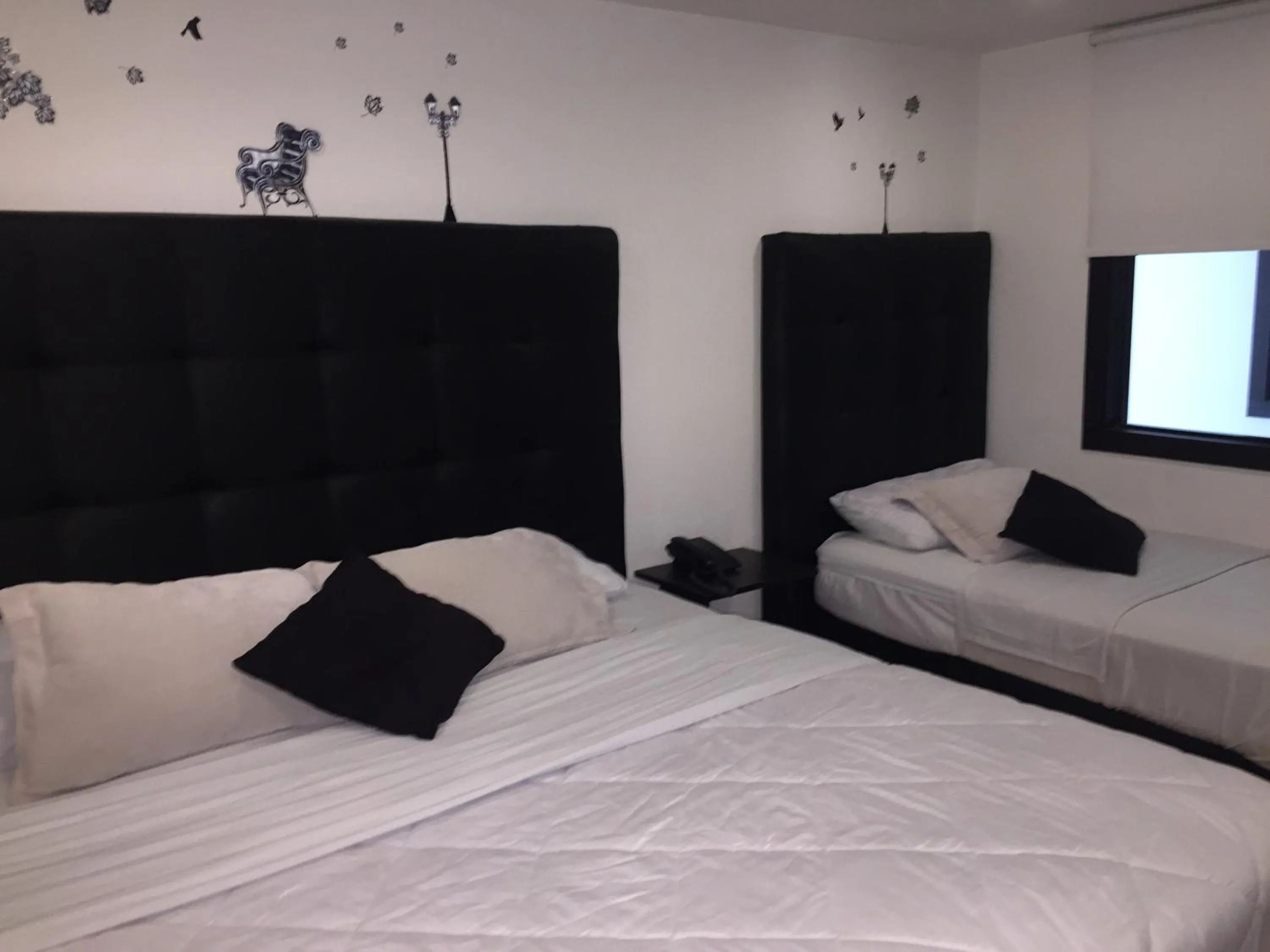 Bed in Hotel Montecarlo Boutique