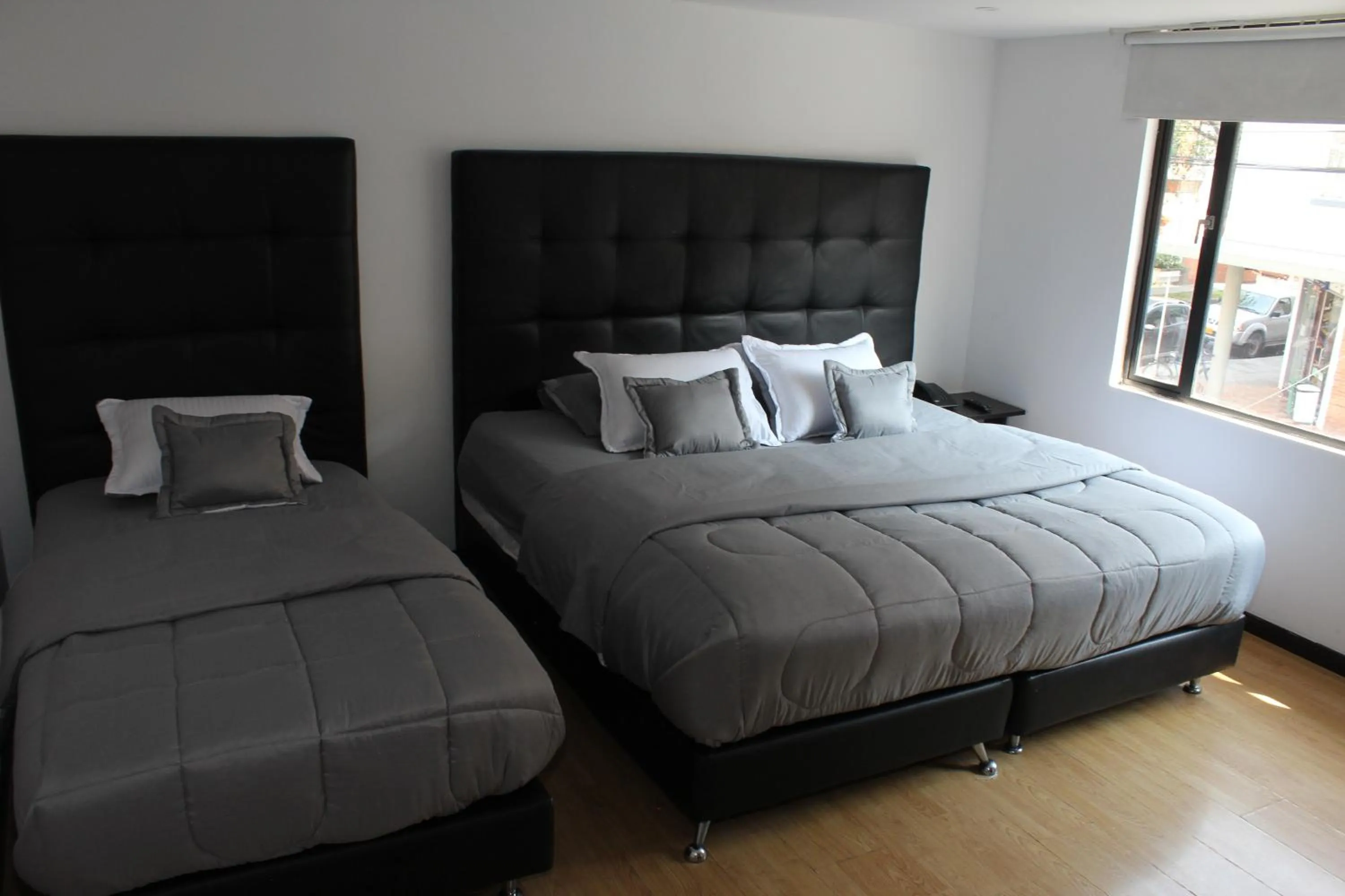 Bed in Hotel Montecarlo Boutique