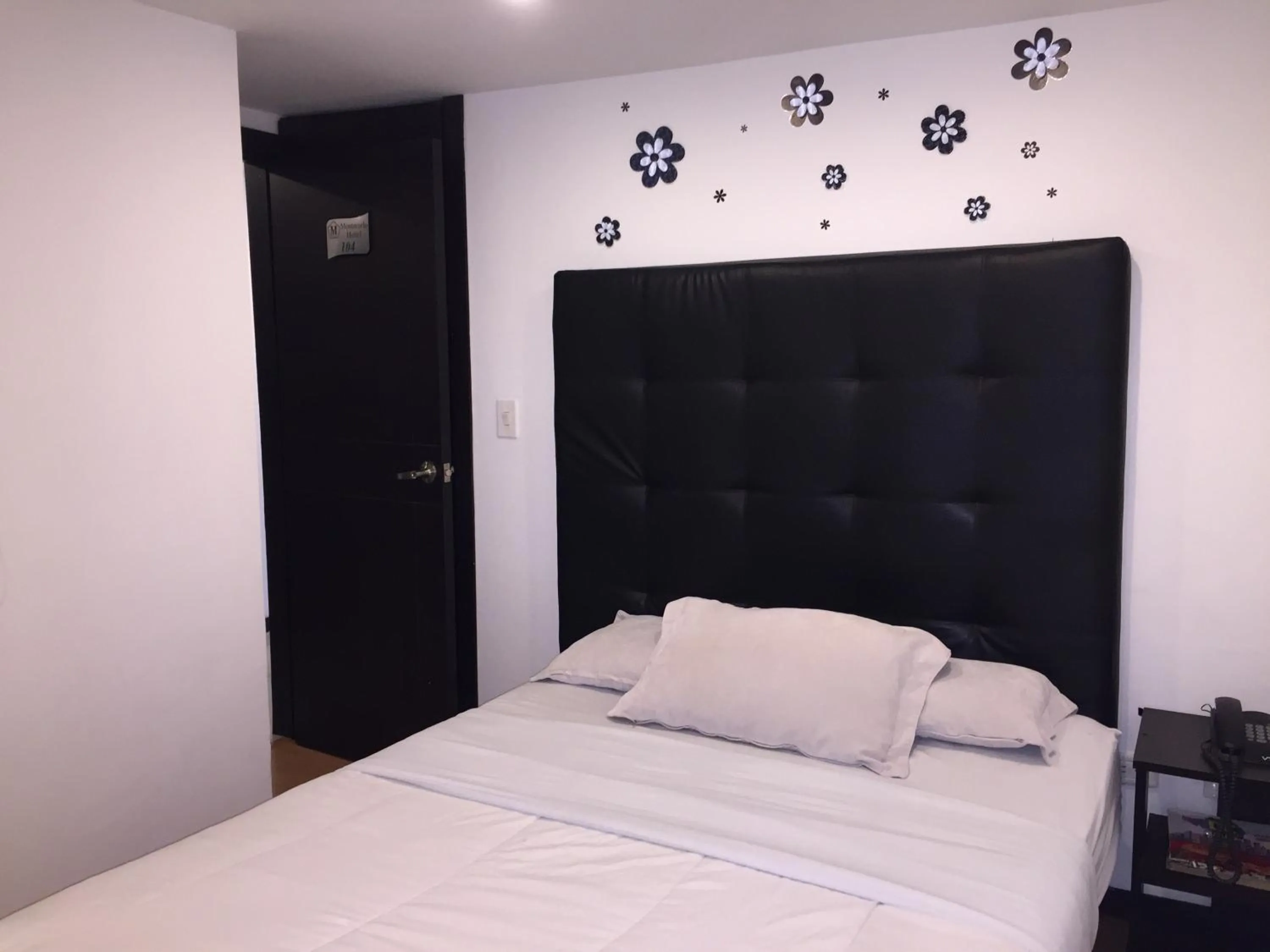 Bed in Hotel Montecarlo Boutique