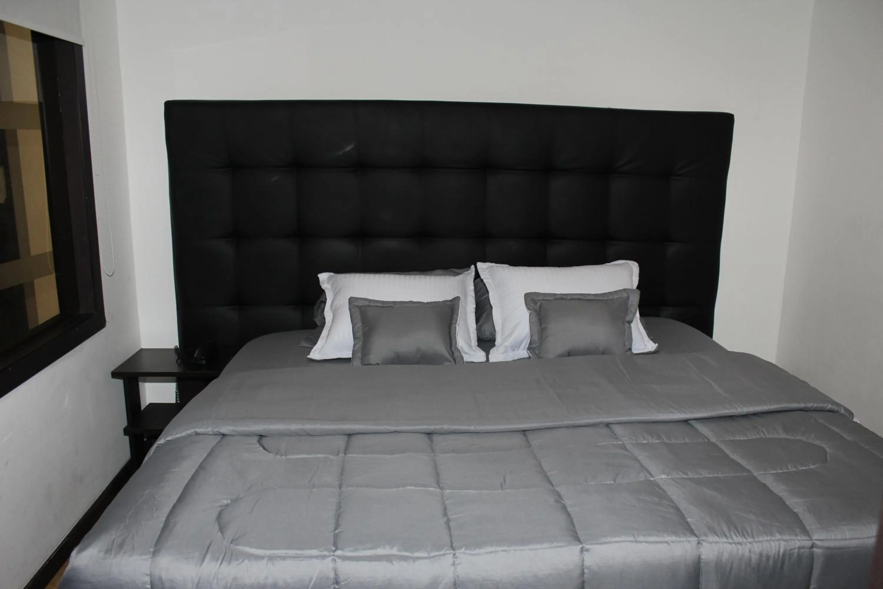 Bed in Hotel Montecarlo Boutique