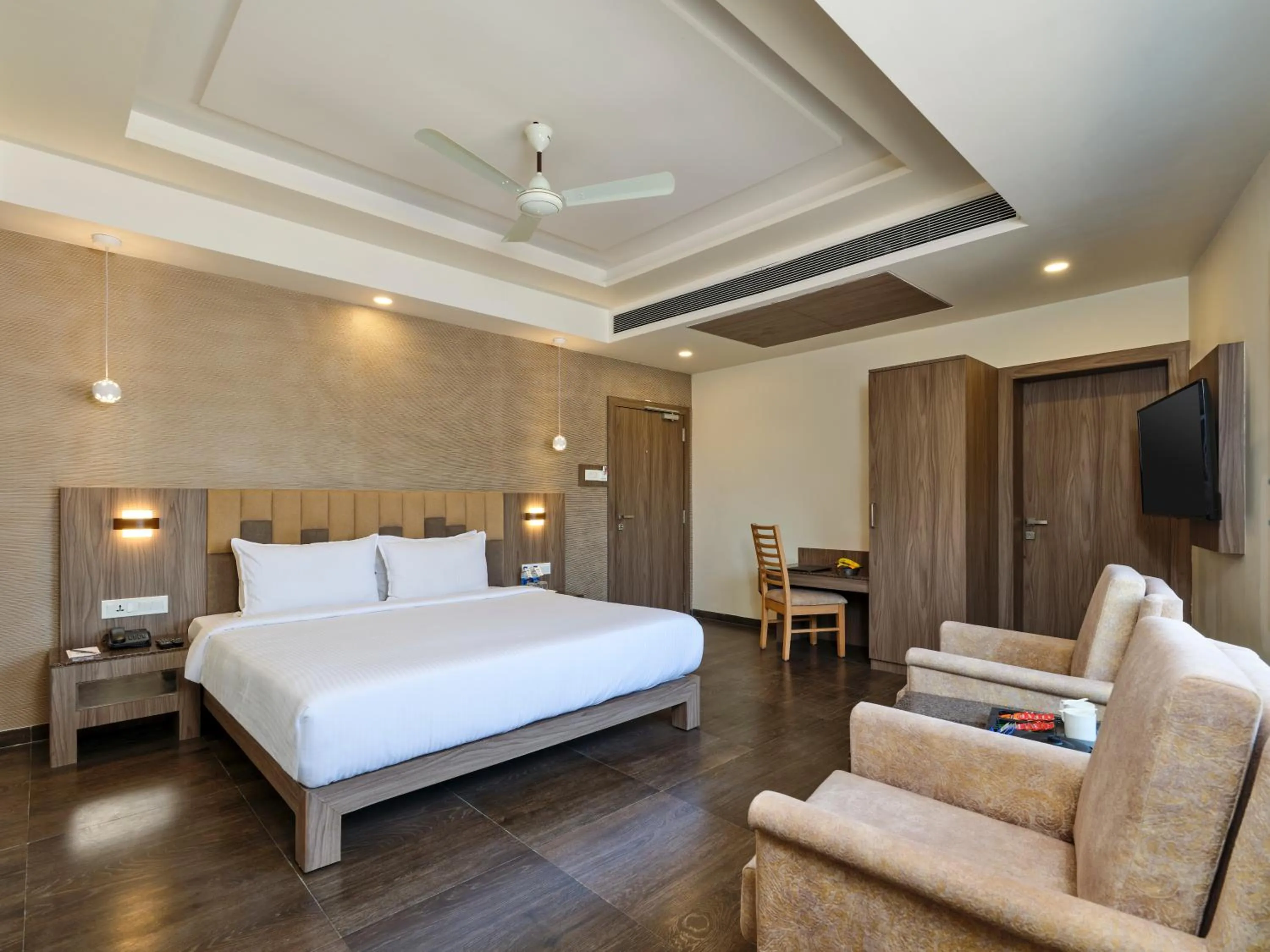 Bed in Pride Biznotel Sasan Gir