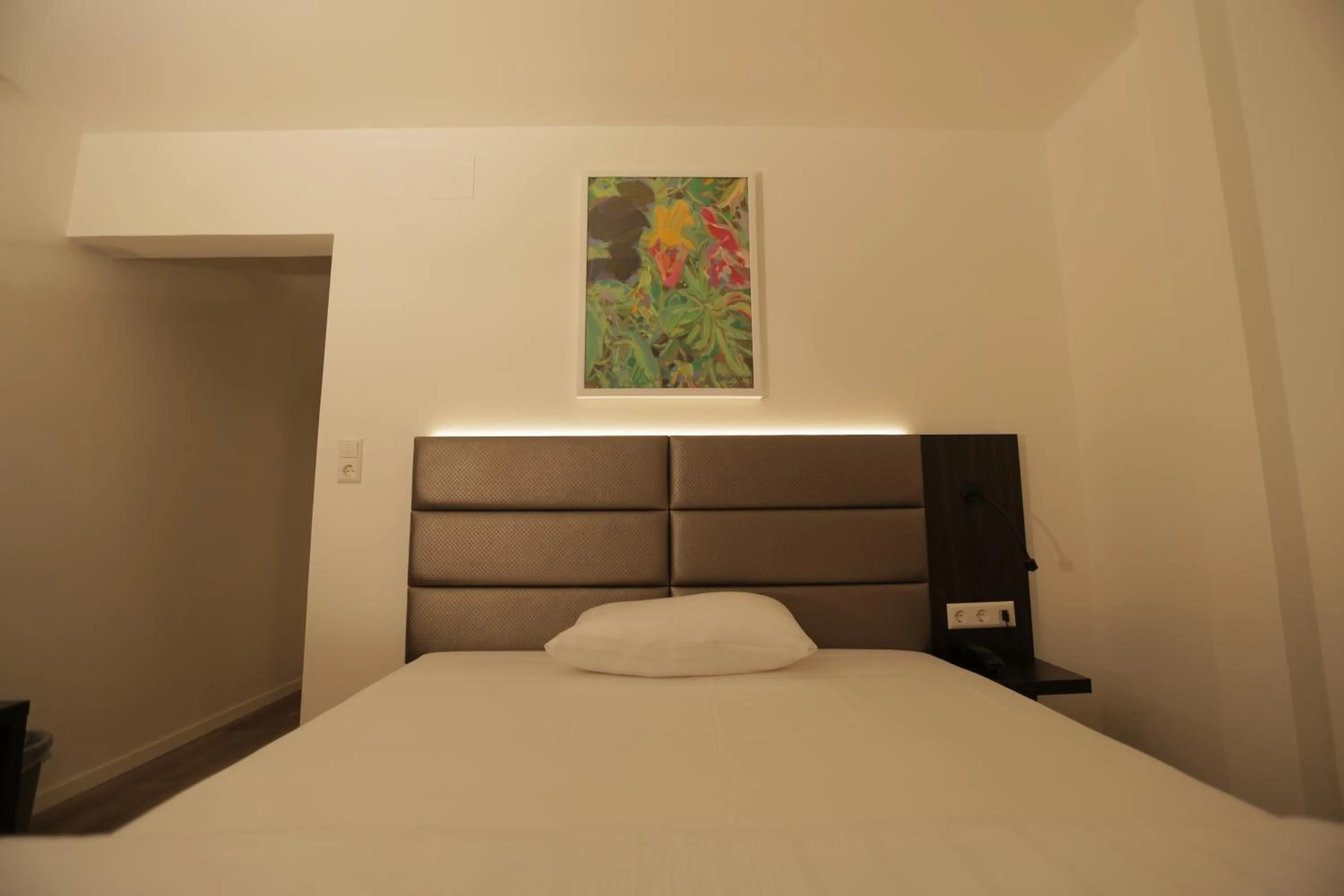 Bed in Galeria Airport Hotel