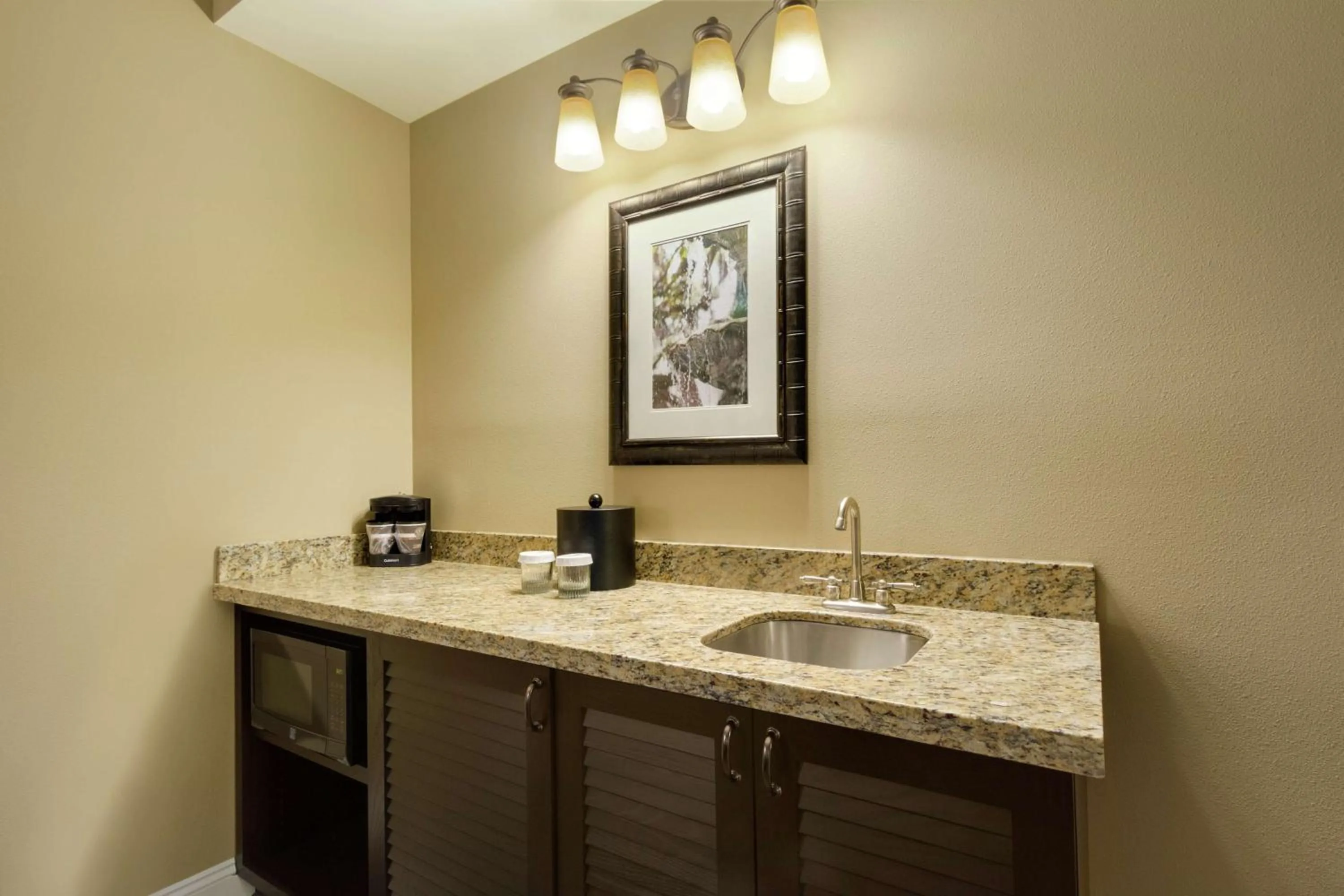 Kitchen or kitchenette in Embassy Suites Savannah Historic District