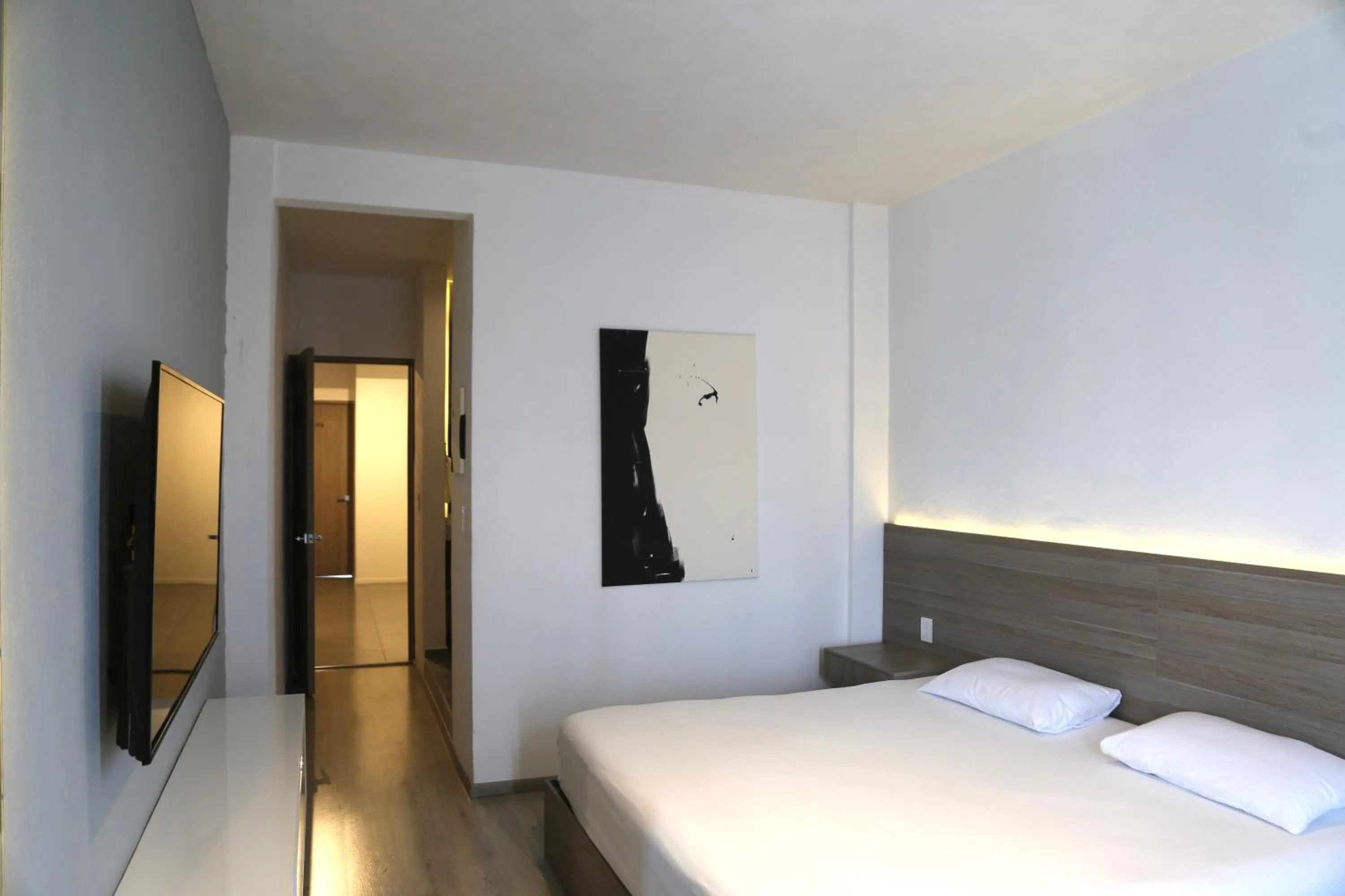 Bed in Hotel Blanco Pachuca