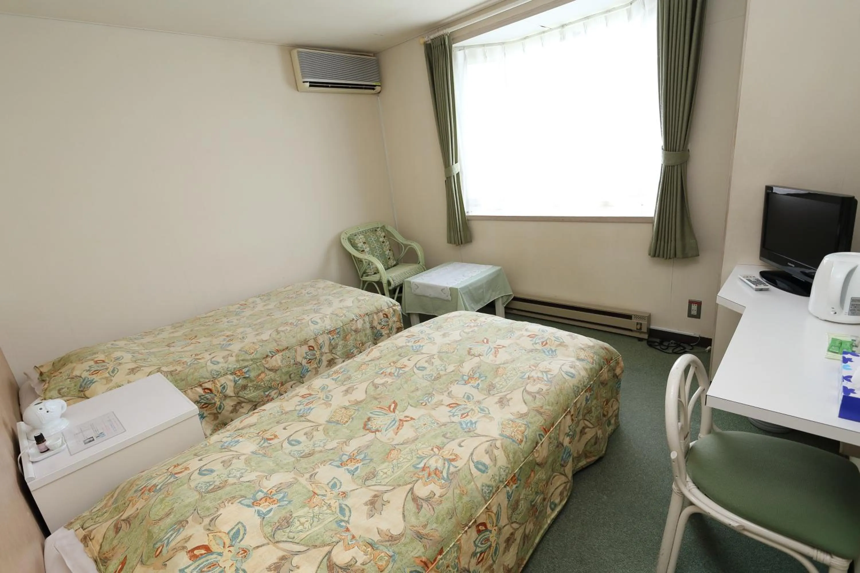 Bed in Gasthof Melange