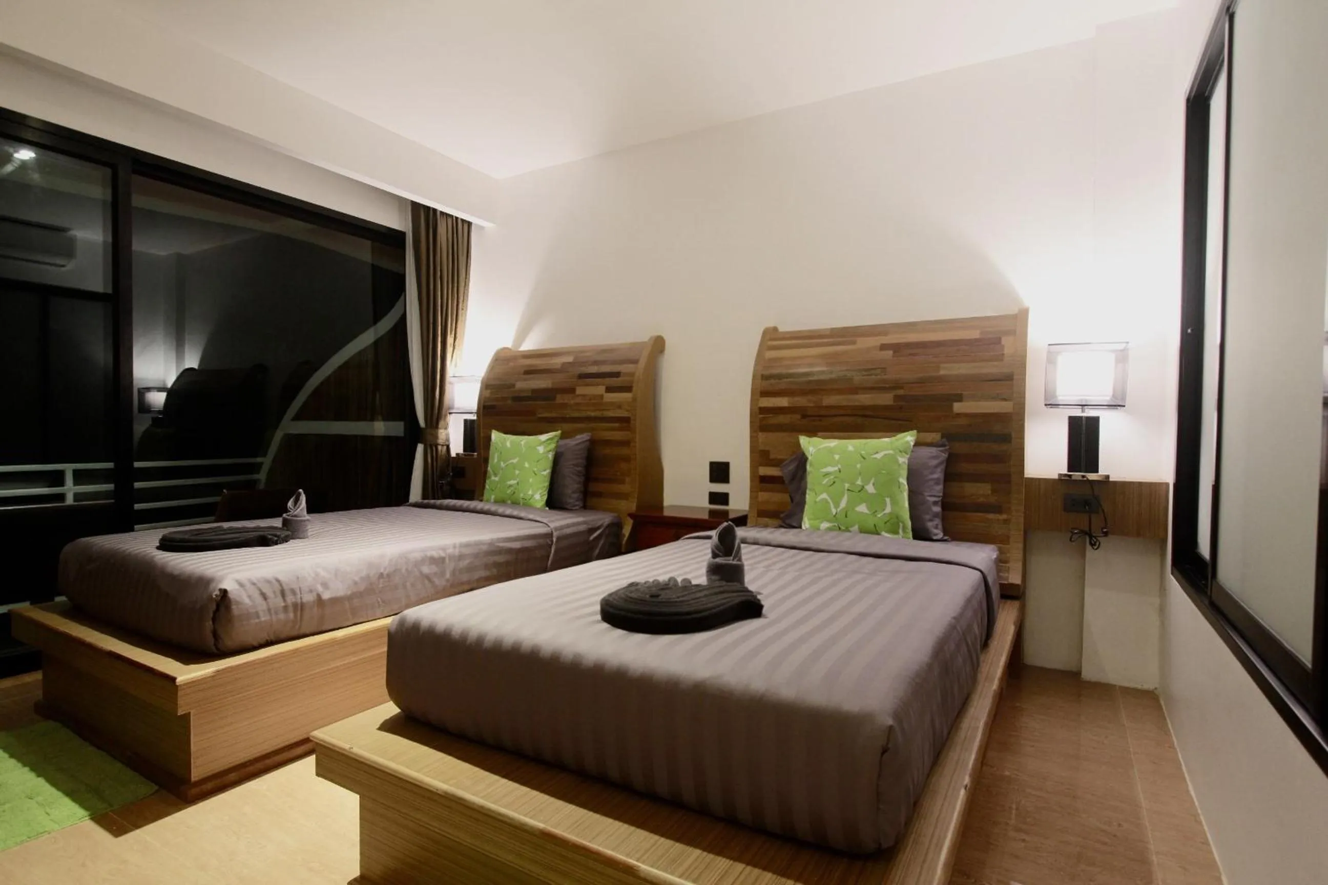 Photo of the whole room, Bed in AC 2 Resort