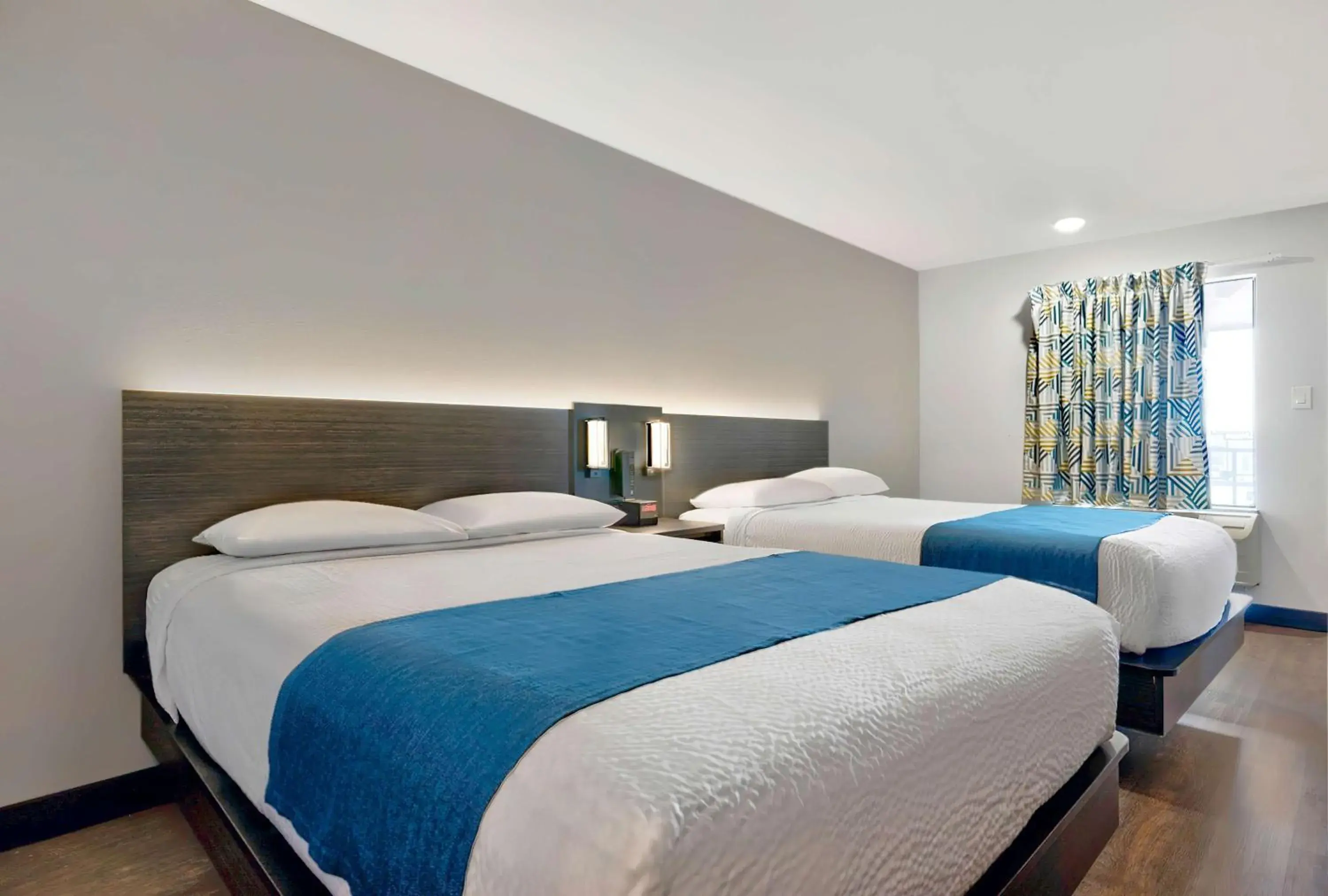 Queen Room with Two Queen Beds - single occupancy - Smoking in Studio 6 Waco TX - Downtown - Baylor Queen Room with Two Queen Beds - single occupancy - Smoking in Studio 6 Waco TX - Downtown - Baylor