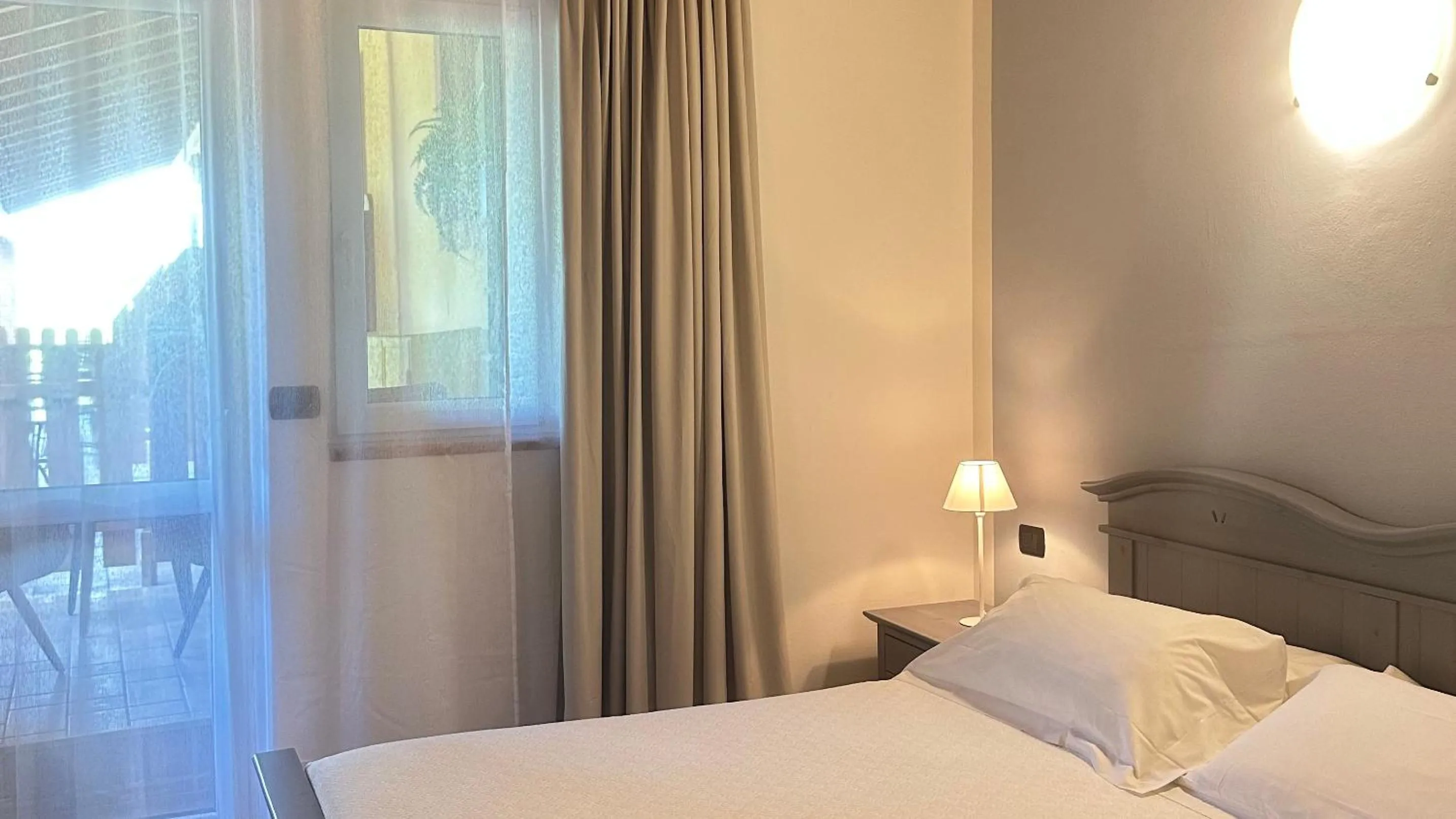 Photo of the whole room, Bed in Locanda Arizona