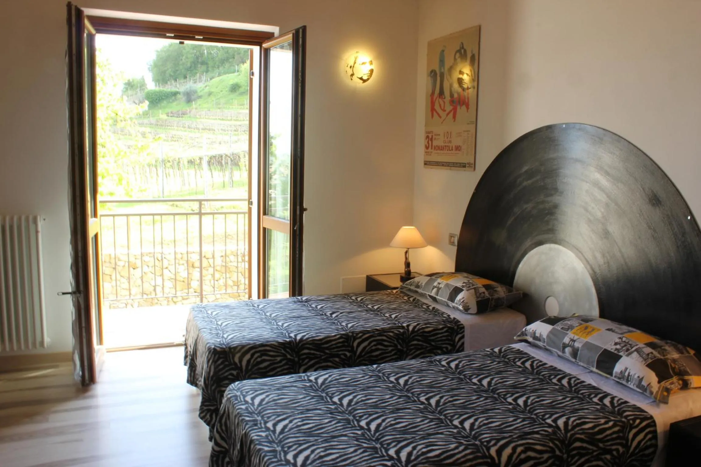 View (from property/room), Bed in La Bella Vigna