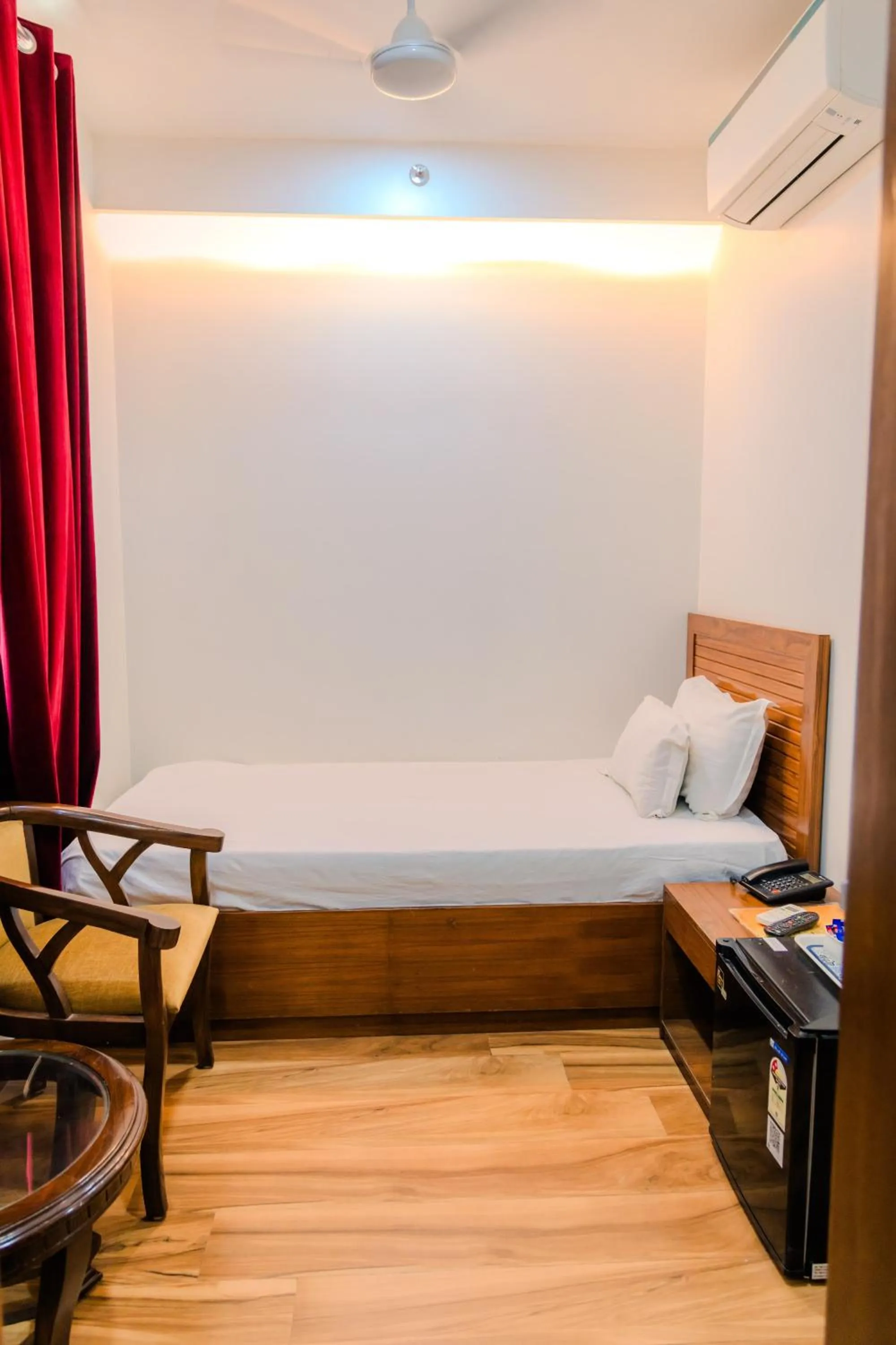 Bed in Peepal Tree Residency