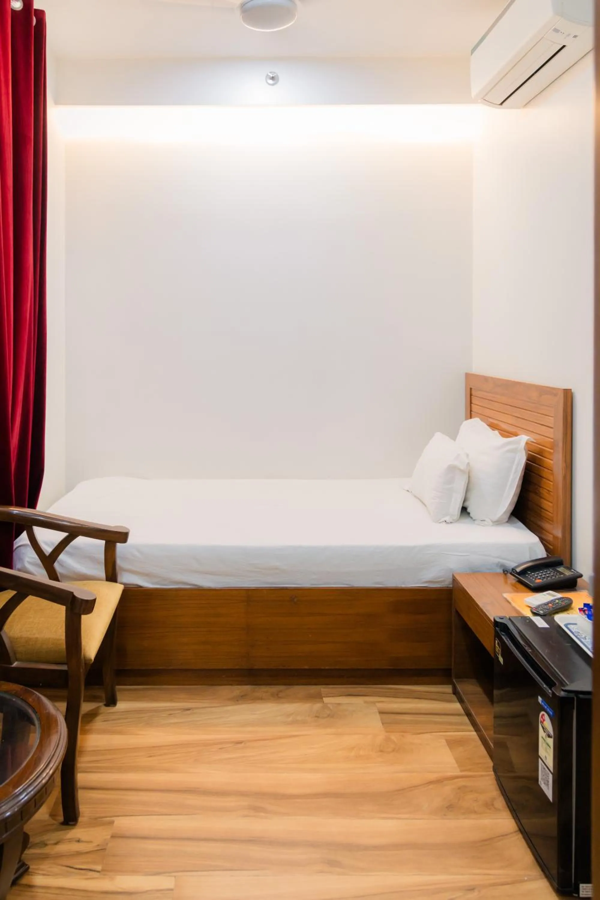 Bed in Peepal Tree Residency