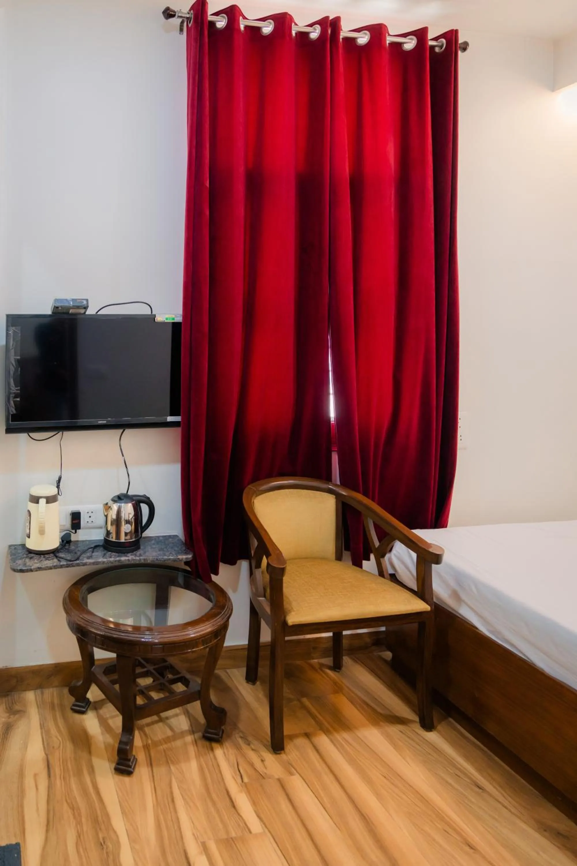 Bed in Peepal Tree Residency