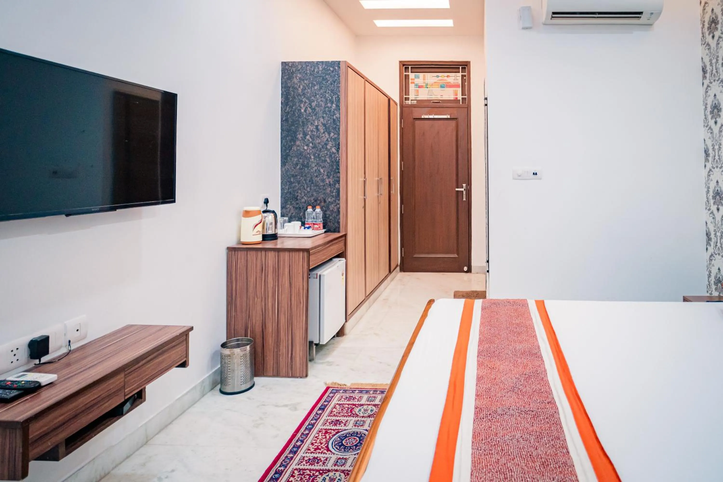 Bed in Peepal Tree Residency