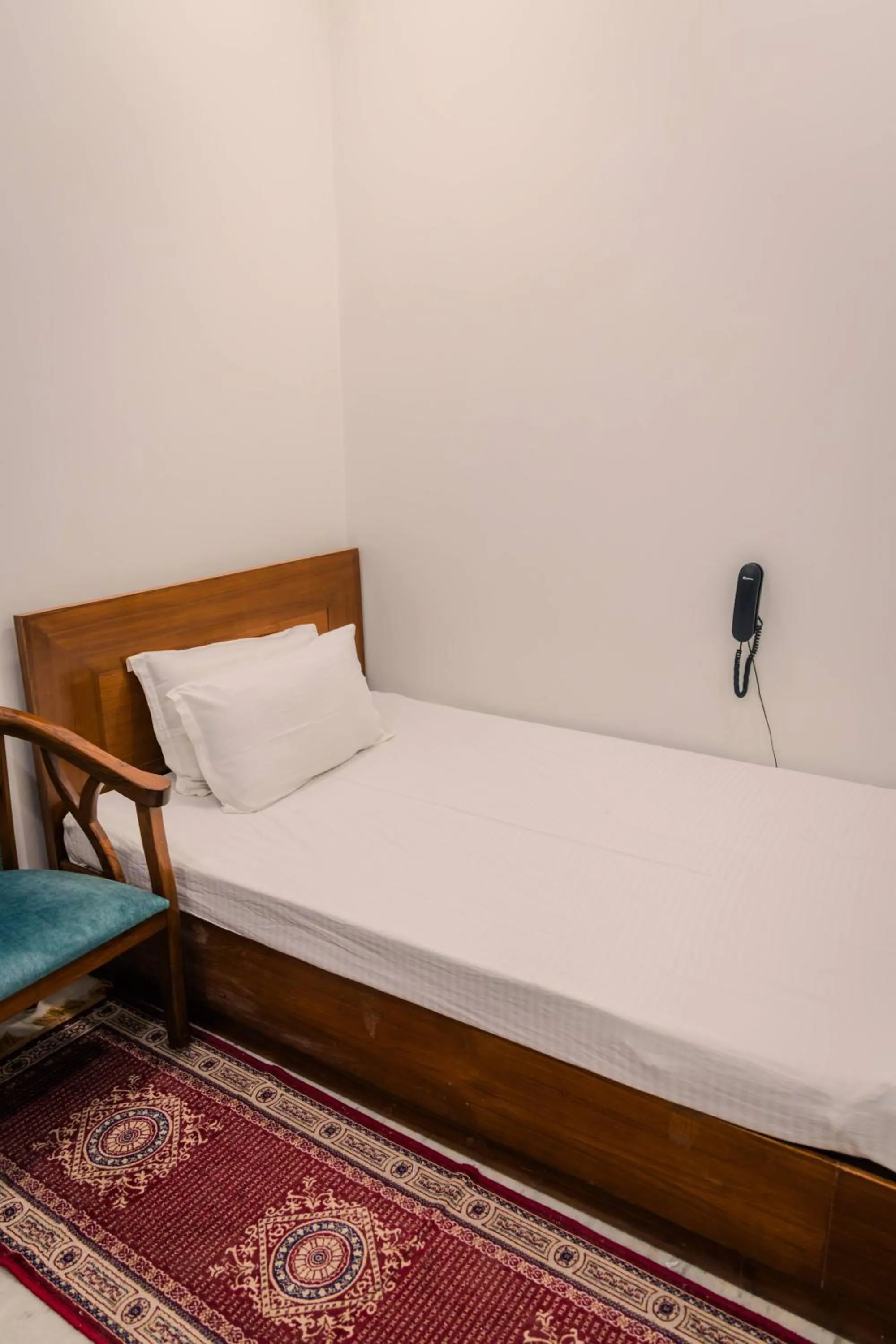 Bed in Peepal Tree Residency