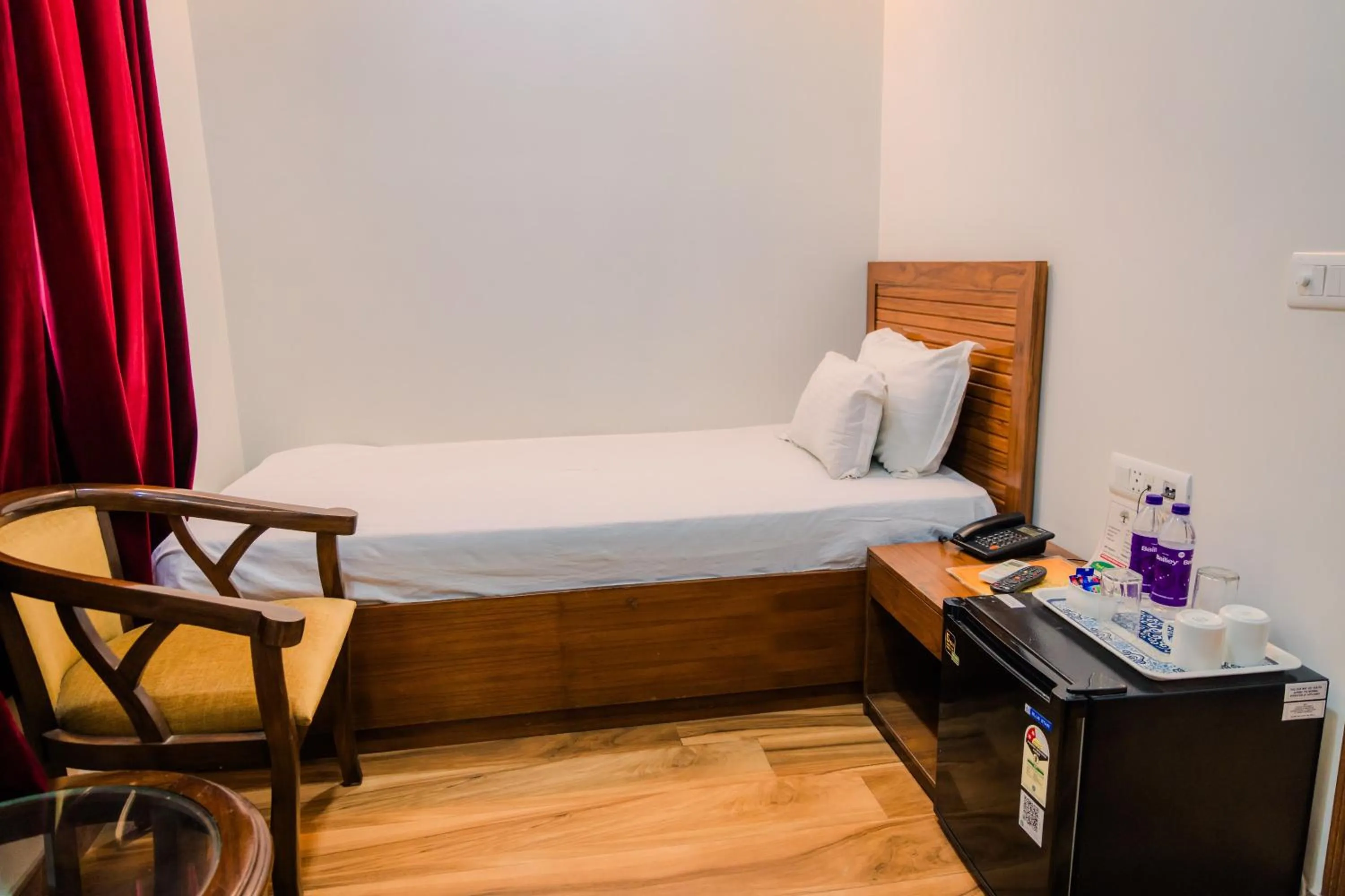 Bed in Peepal Tree Residency