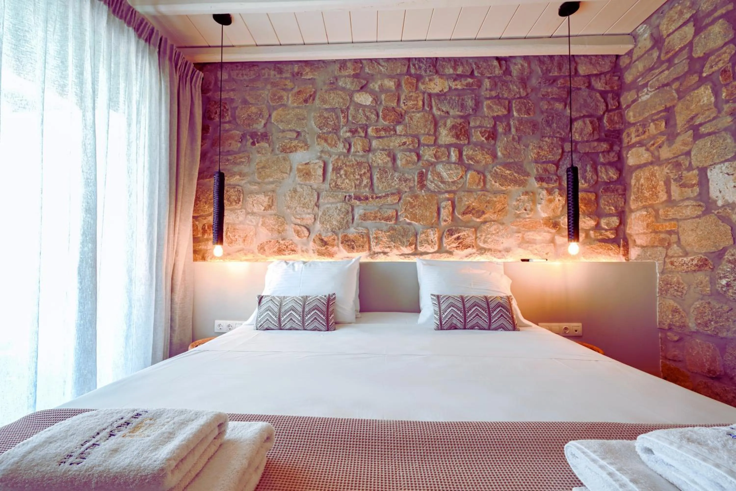 Bed in Aegean Hospitality