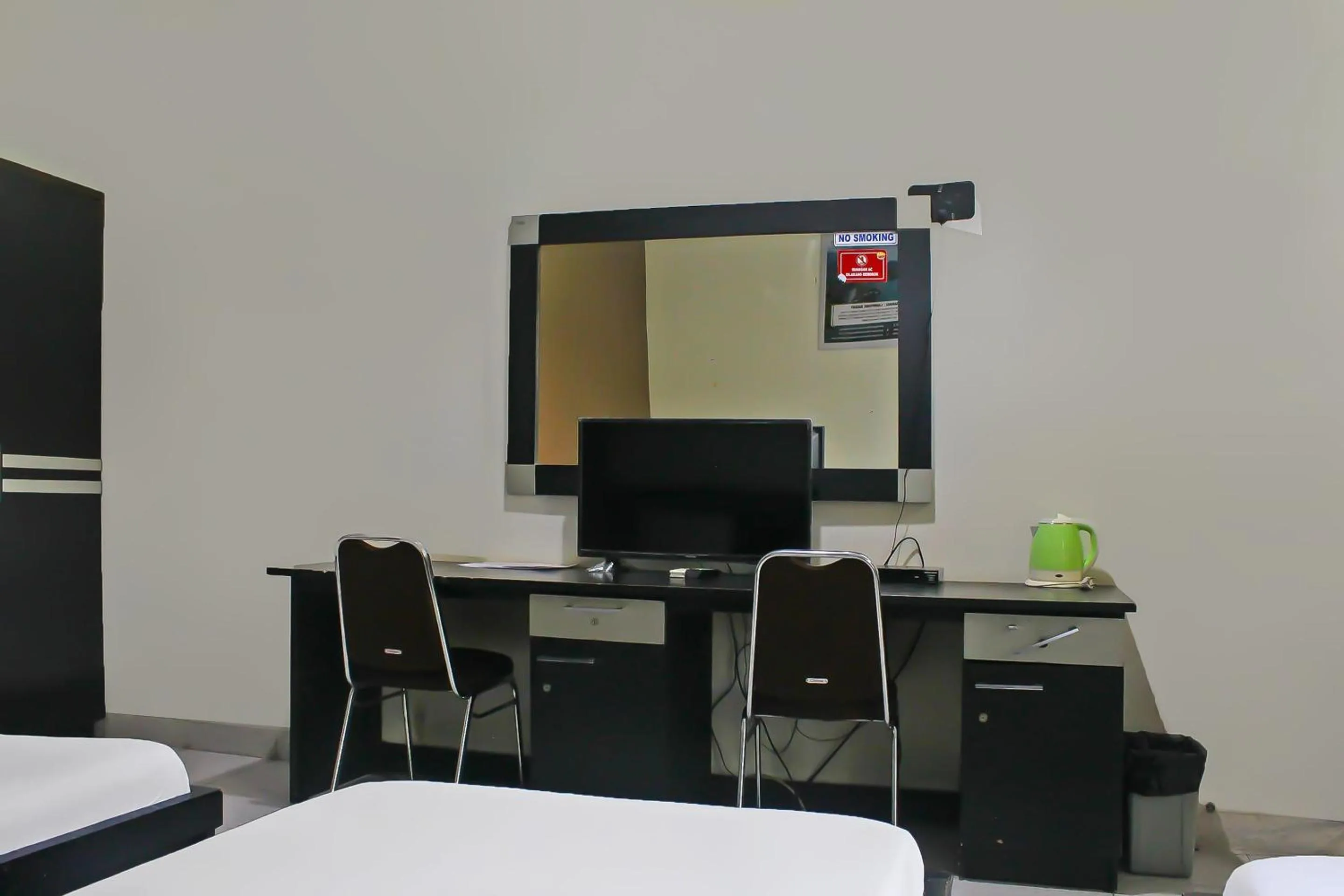 Bedroom in Collection O 92268 Hotel Aero