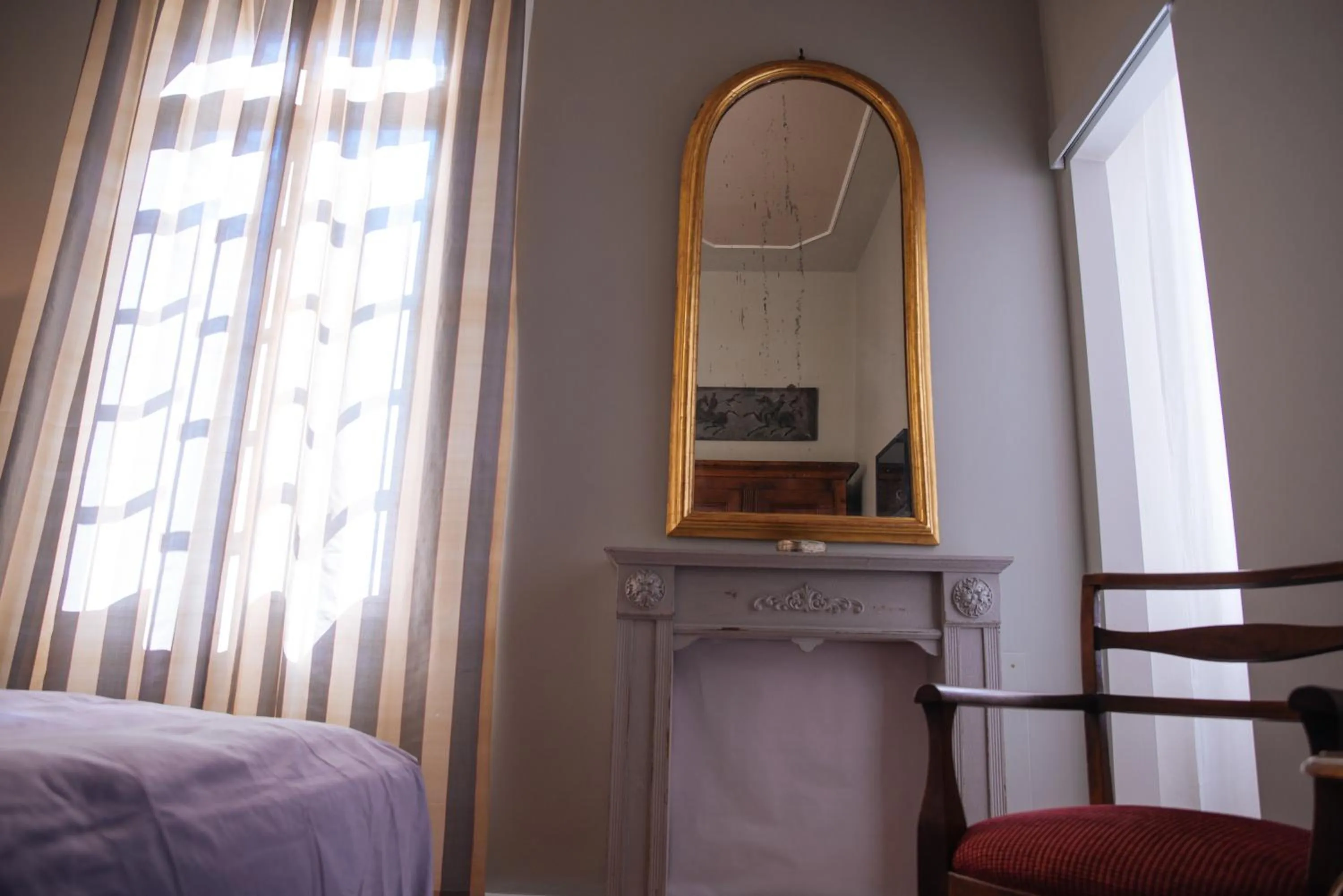 Decorative detail, Bed in Ai tre cedri B&B