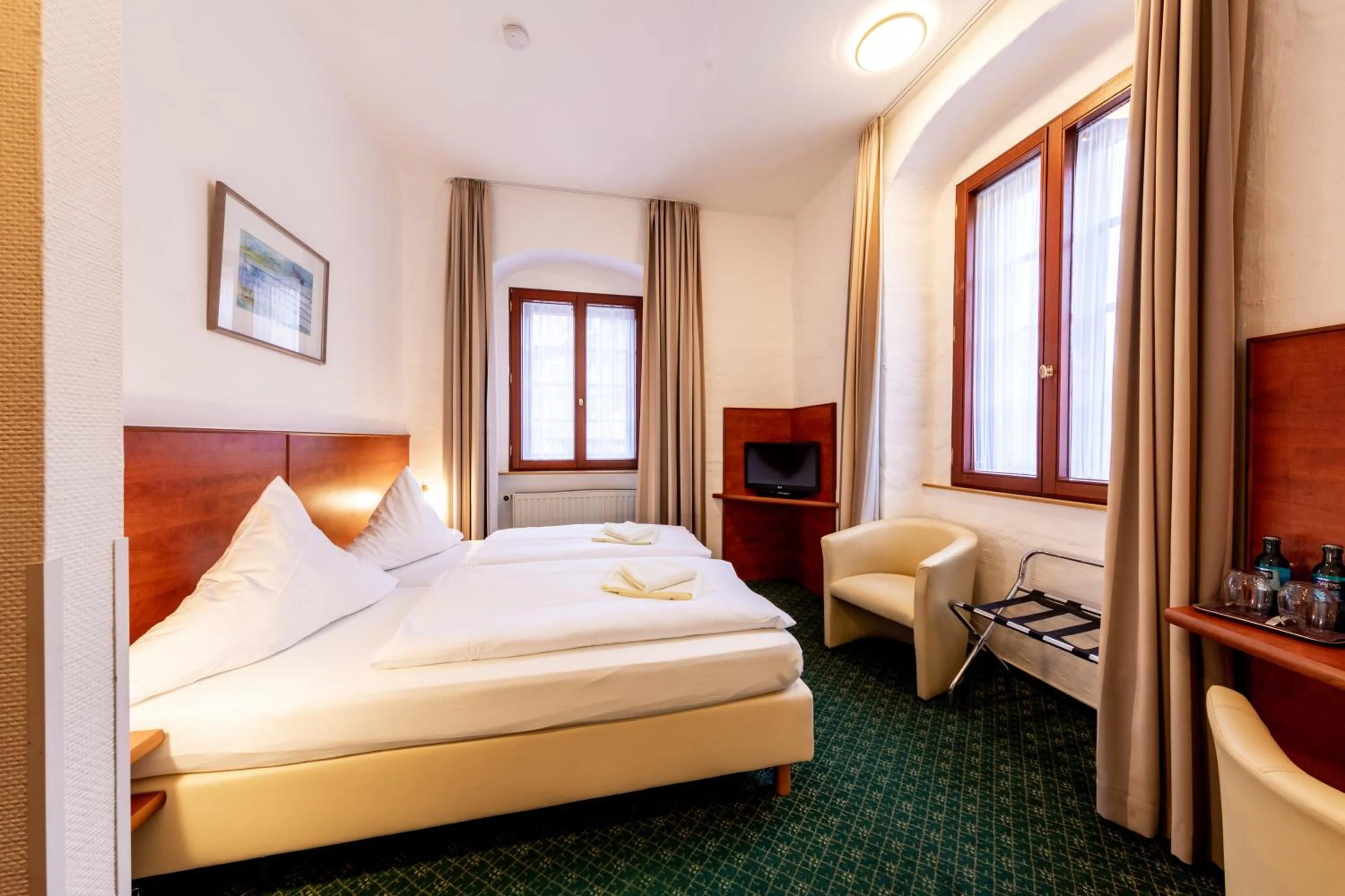 Photo of the whole room, Bed in Ringhotel Jägerhof