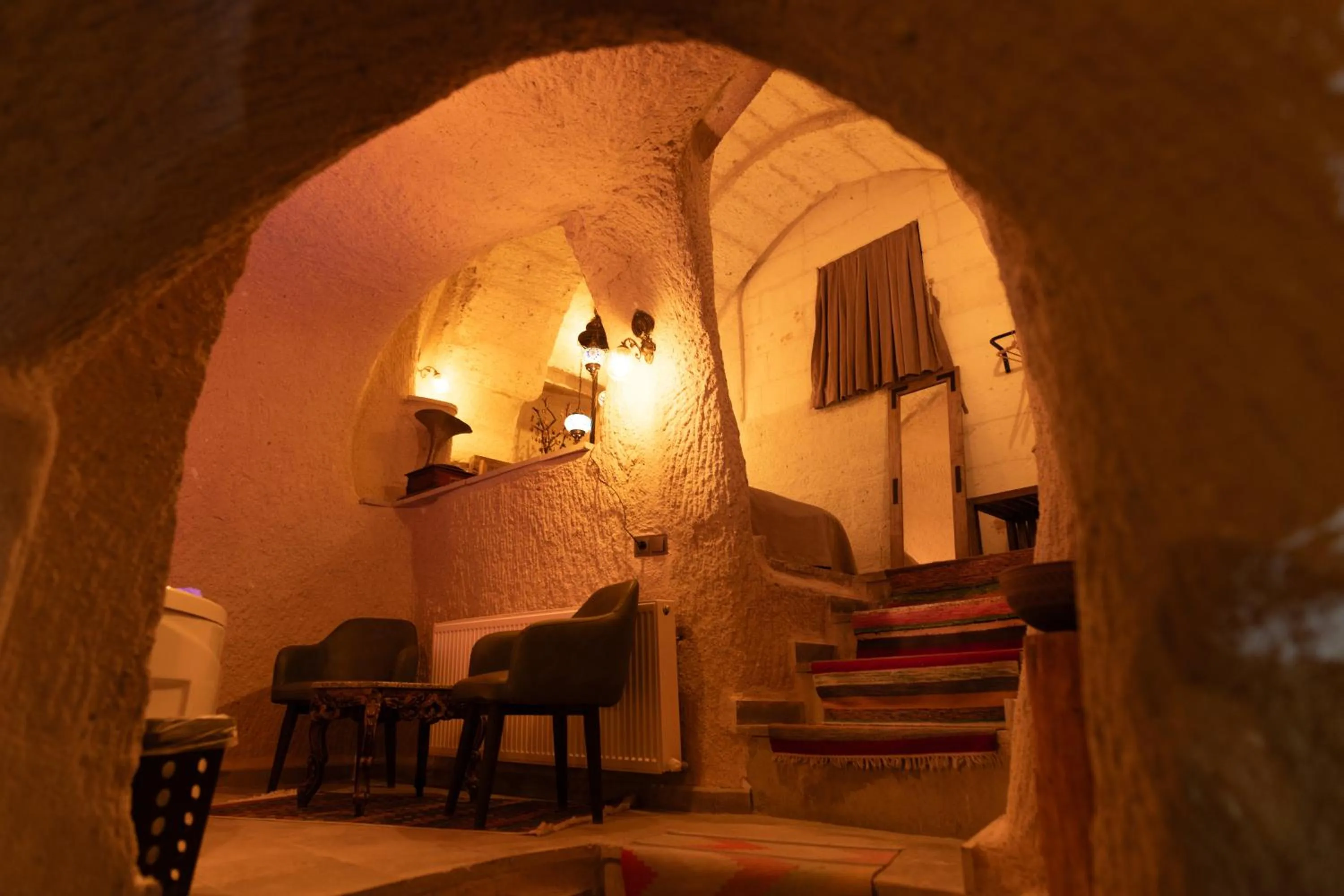Seating area in Lemon Cave Suites