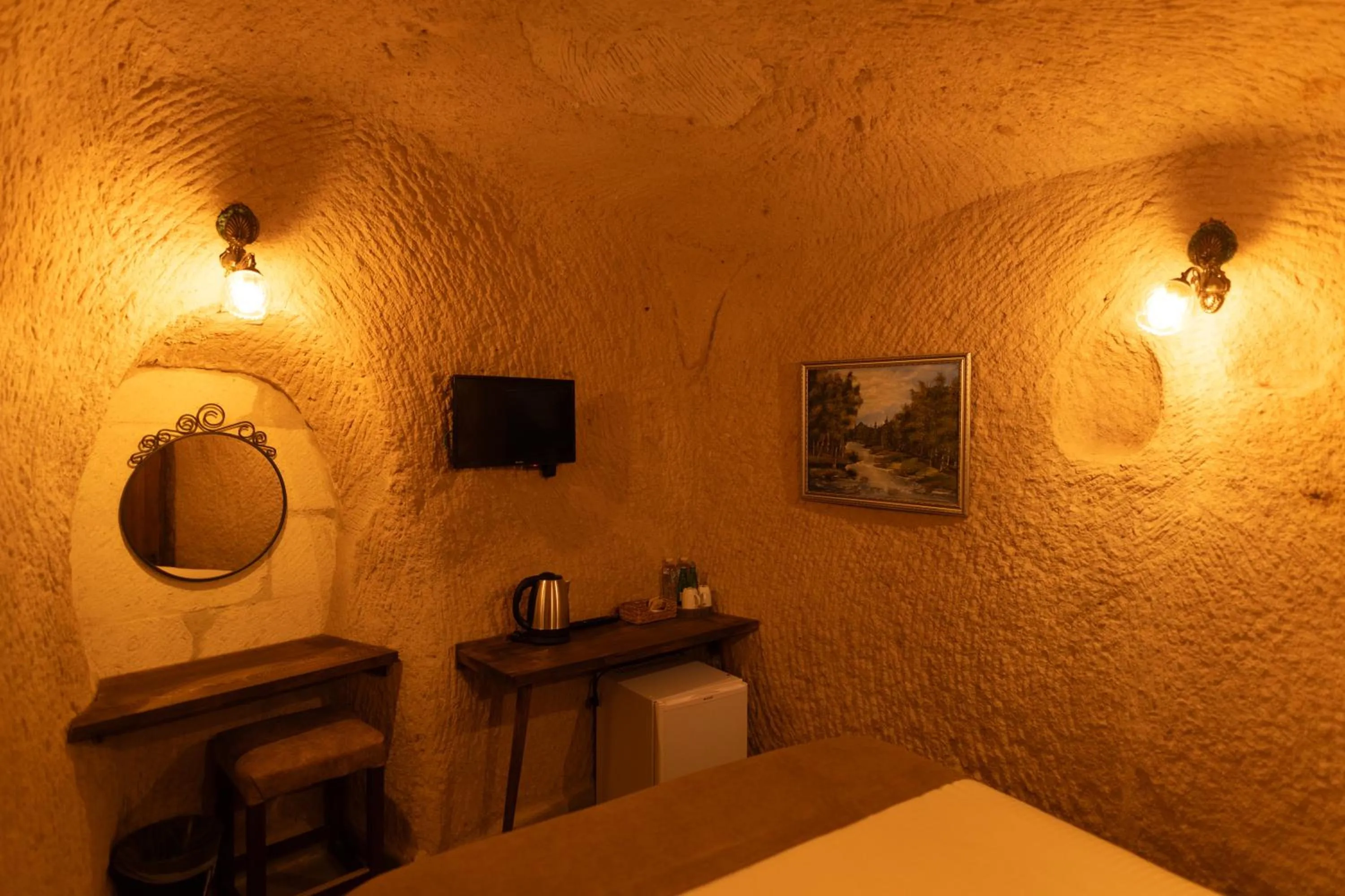 Decorative detail, Bed in Lemon Cave Suites