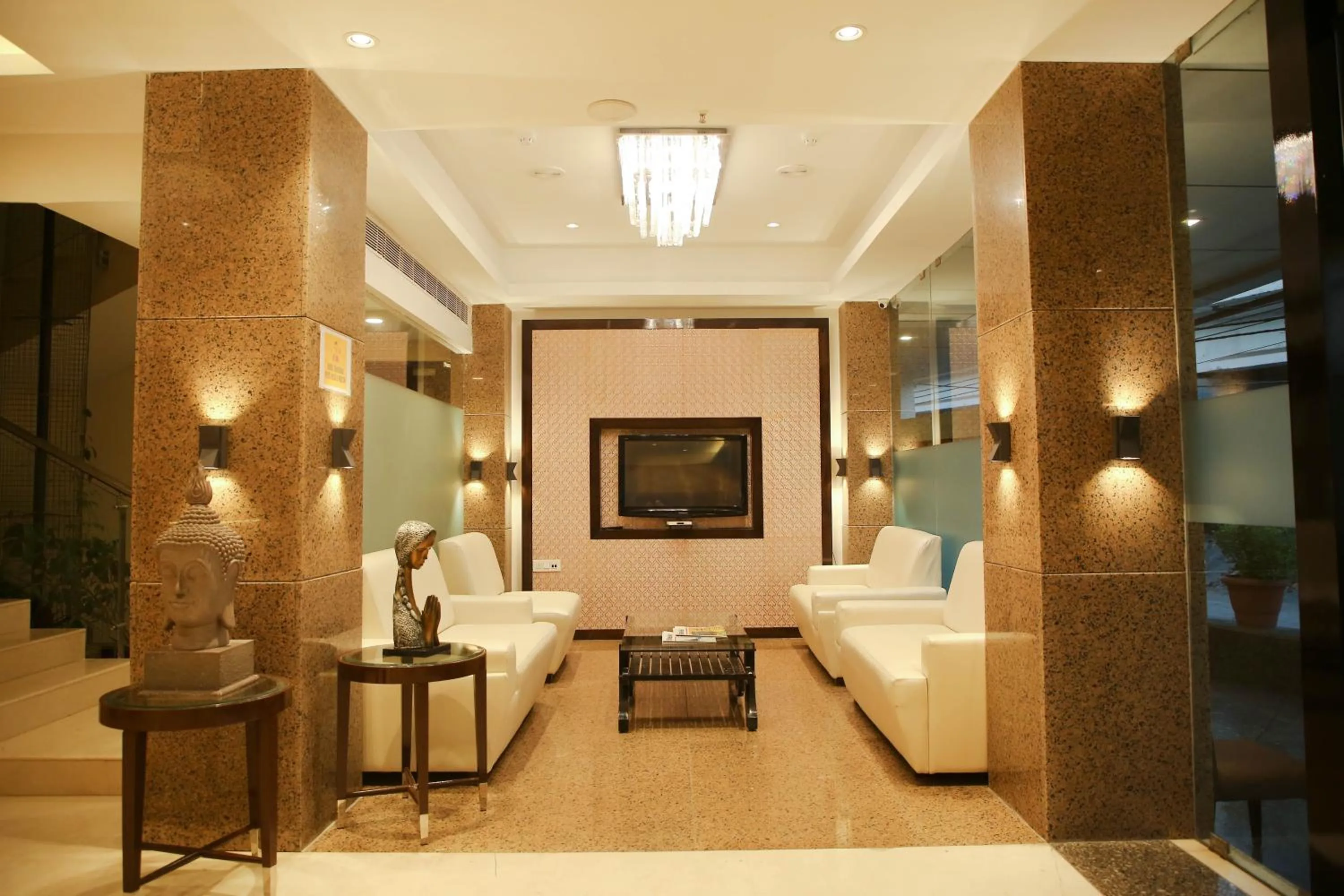 Lobby or reception, Bed in Citrus Prime Raipur