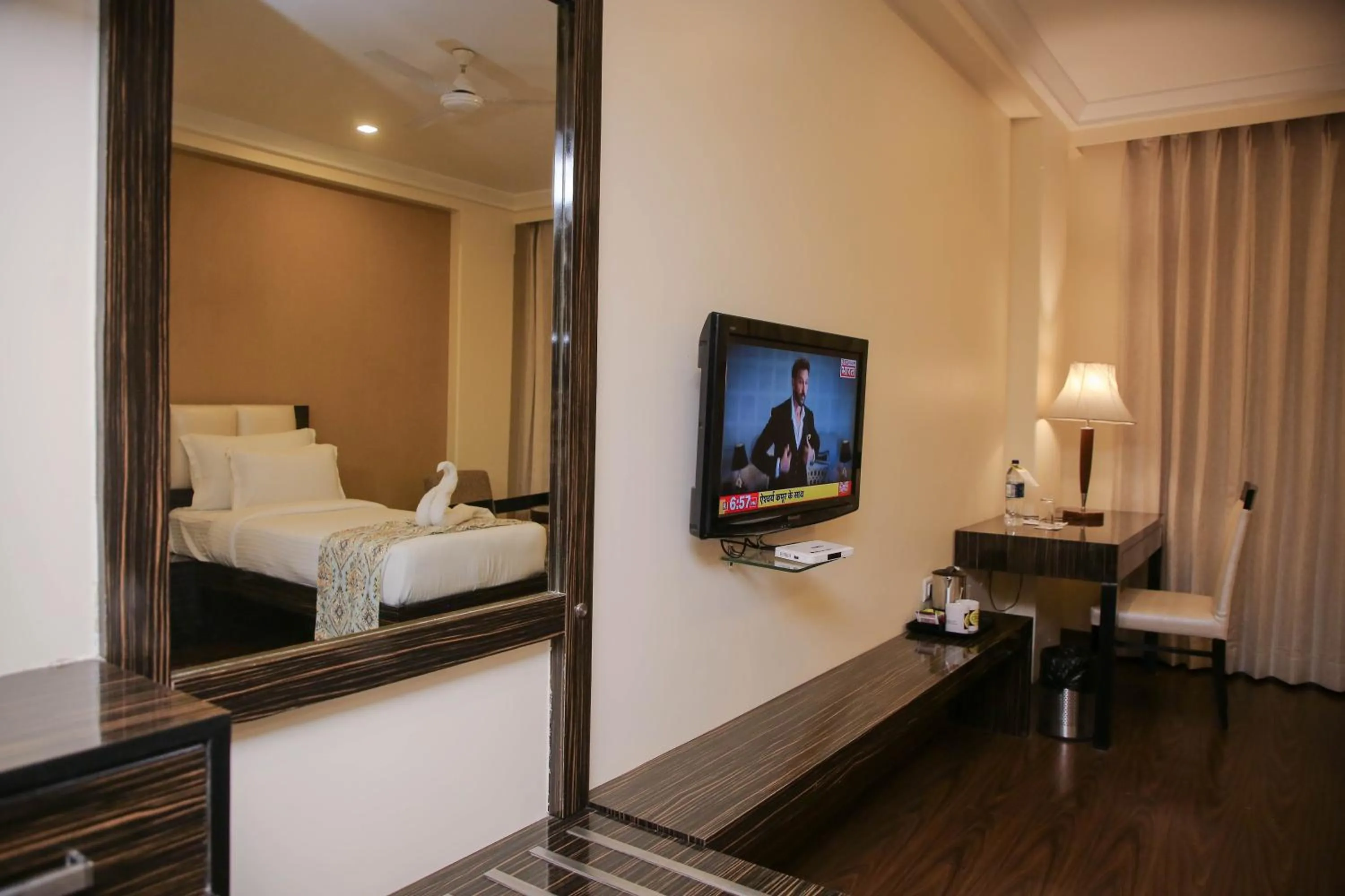 Photo of the whole room, Bed in Citrus Prime Raipur