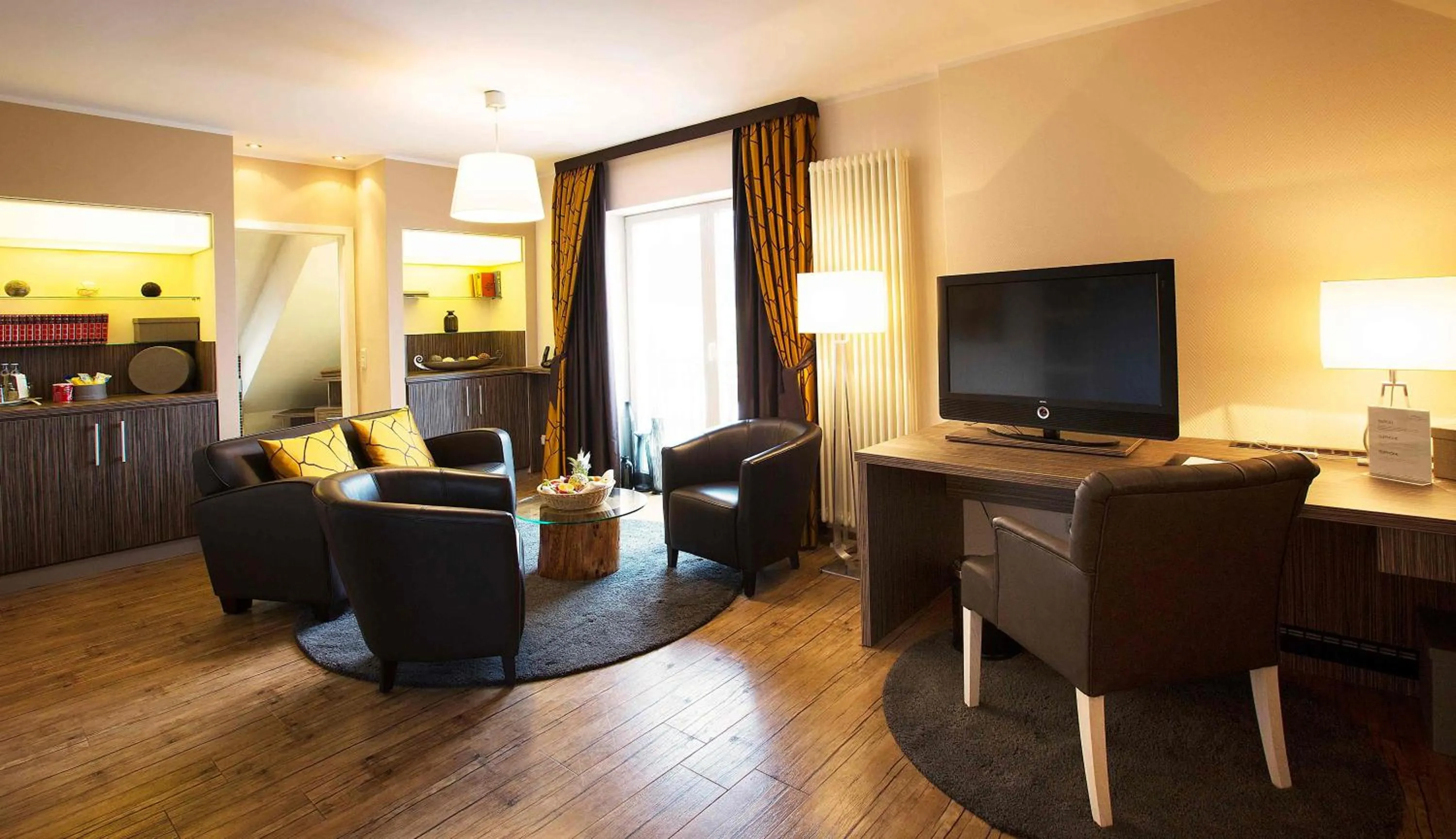 Living room in REGIOHOTEL Berghotel Ilsenburg - #Panoramablick #Wellness #Wallbox #GroßesAbendbuffet