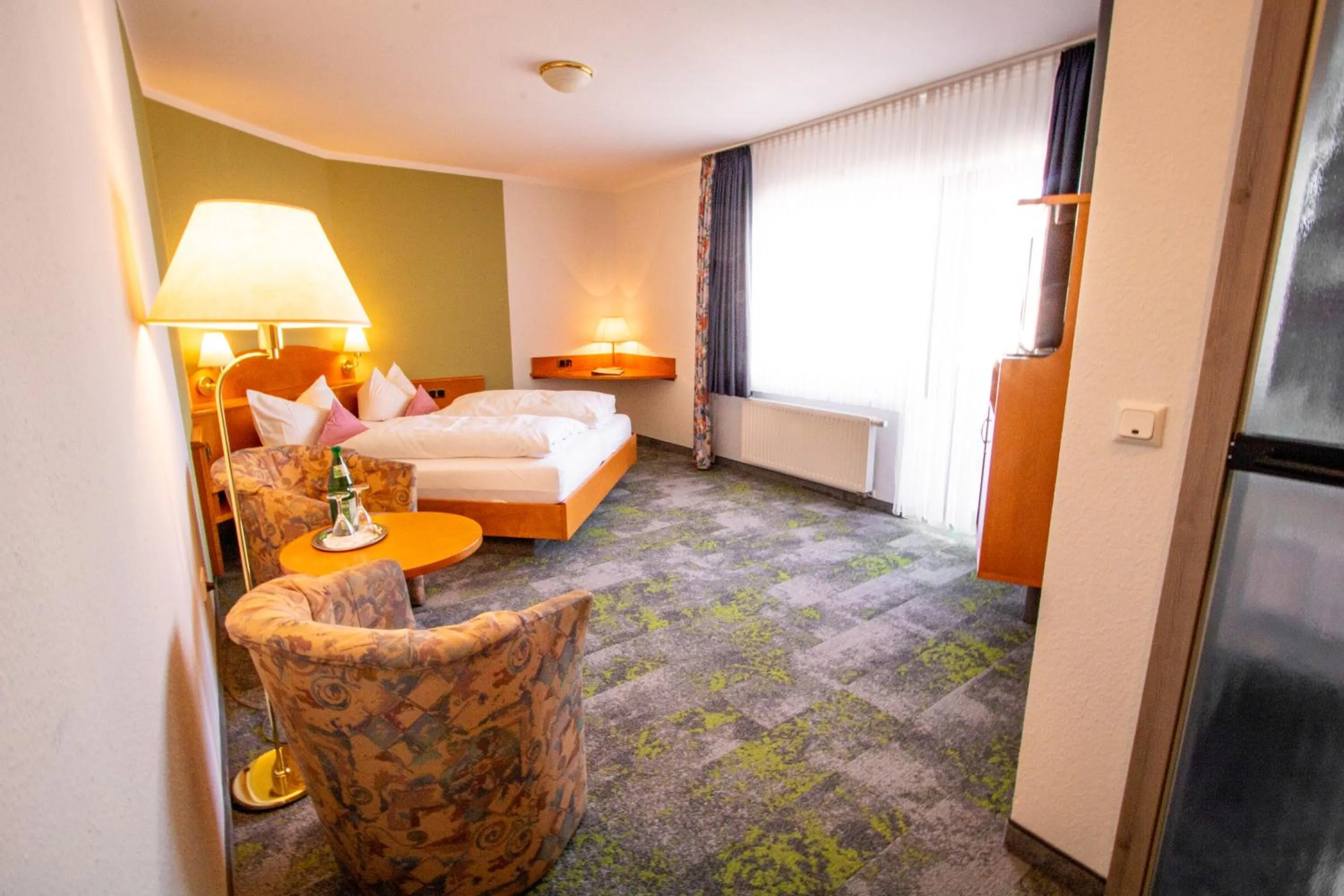 Photo of the whole room, Bed in LandKomfort Hotel Elsenmann Garni