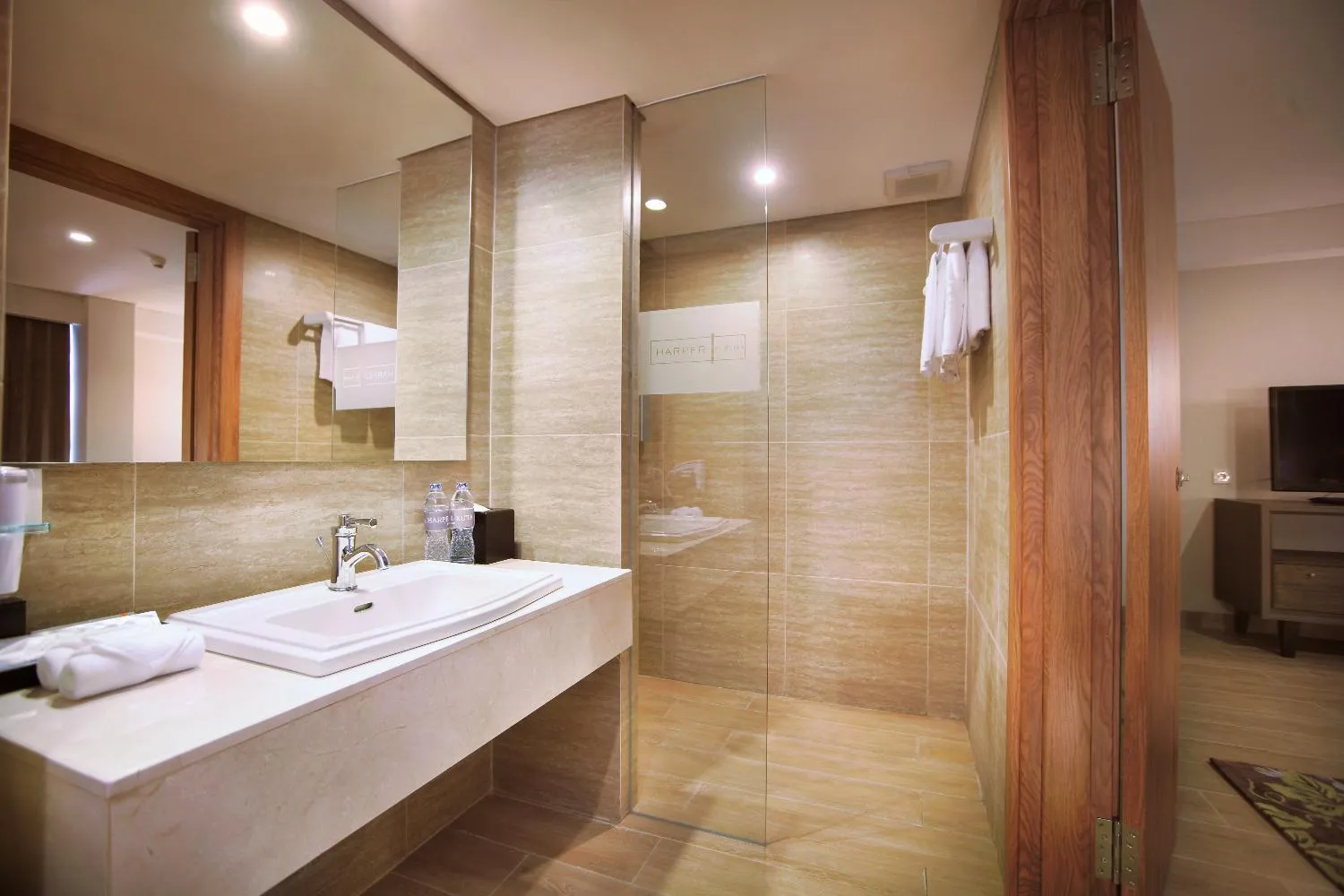 Bathroom, Bed in Harper Kuta Hotel by ASTON